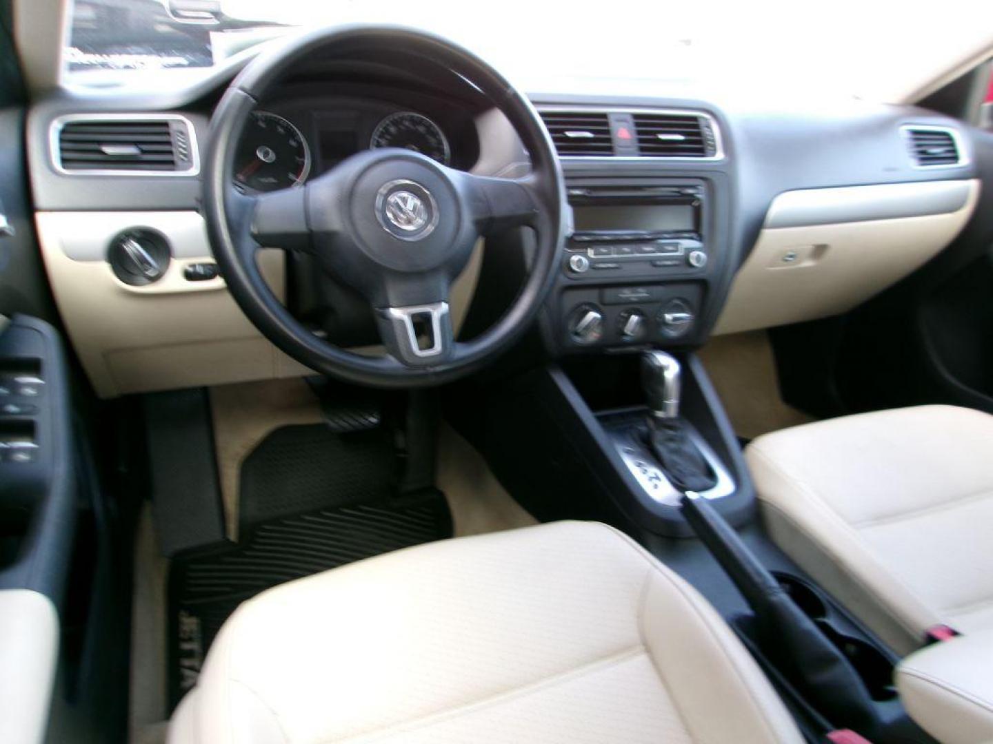 2013 RED VOLKSWAGEN JETTA SE (3VWDP7AJ9DM) with an 2.5L engine, Automatic transmission, located at 501 E. Columbia St., Springfield, OH, 45503, (800) 262-7122, 39.925262, -83.801796 - *** New Tires *** Tune Up *** New Brakes *** SE 2.5L *** Serviced and Detailed *** Leather *** Jay North Auto has offered hand picked vehicles since 1965! Our customer's enjoy a NO pressure buying experience with a small town feel. All of our vehicles get fully inspected and detailed. We are a - Photo#6