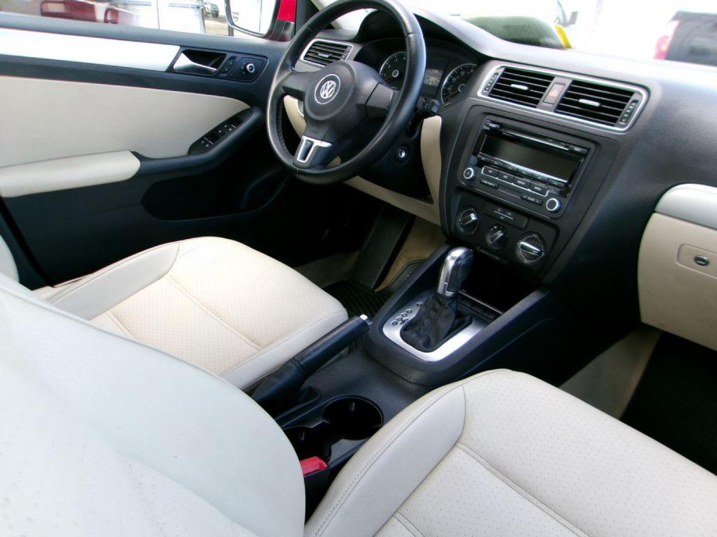 2013 RED VOLKSWAGEN JETTA SE (3VWDP7AJ9DM) with an 2.5L engine, Automatic transmission, located at 501 E. Columbia St., Springfield, OH, 45503, (800) 262-7122, 39.925262, -83.801796 - *** New Tires *** Tune Up *** New Brakes *** SE 2.5L *** Serviced and Detailed *** Leather *** Jay North Auto has offered hand picked vehicles since 1965! Our customer's enjoy a NO pressure buying experience with a small town feel. All of our vehicles get fully inspected and detailed. We are a - Photo#11