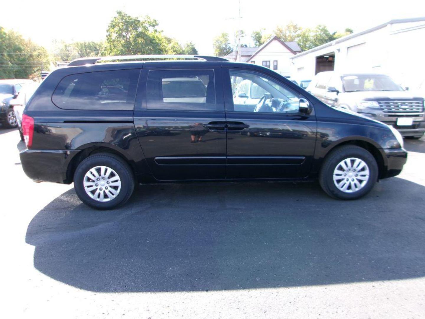 2011 BLACK KIA SEDONA LX (KNDMG4C74B6) with an 3.5L engine, Automatic transmission, located at 501 E. Columbia St., Springfield, OH, 45503, (800) 262-7122, 39.925262, -83.801796 - ***Clean Carfax***LX***New Front and Rear Brake Pads and Rotors***New Air Filter and Cabin Air Filter***New Wiper Blades***Serviced and Ready To Go*** Jay North Auto has offered hand picked vehicles since 1965! Our customer's enjoy a NO pressure buying experience with a small town feel. All of - Photo#1