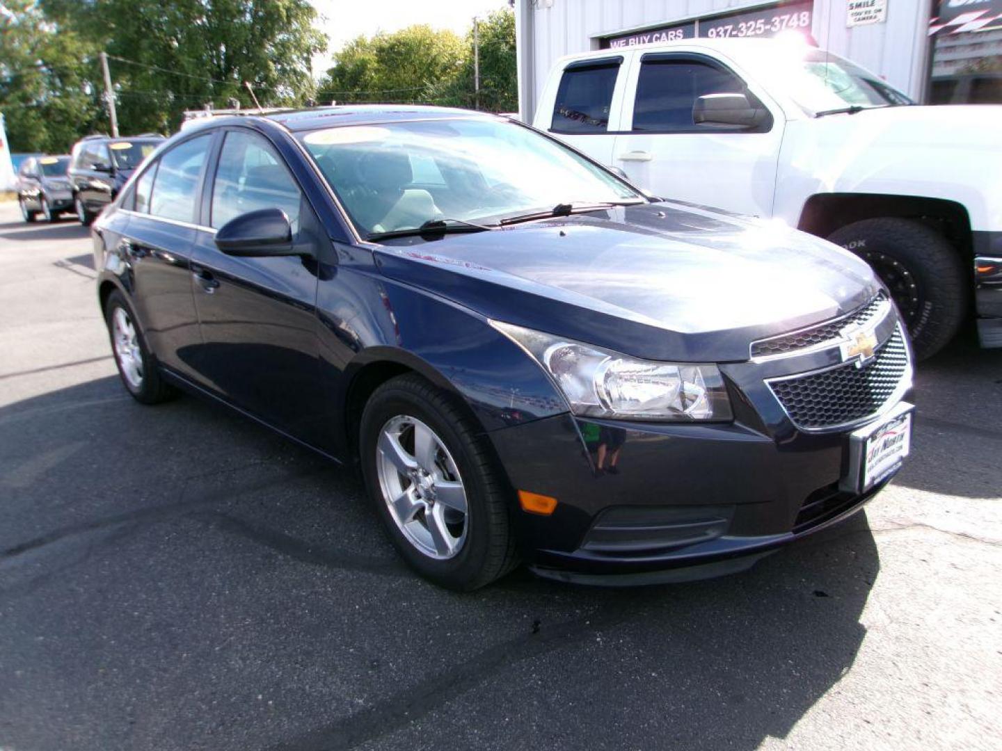 2014 BLUE CHEVROLET CRUZE LT (1G1PC5SB1E7) with an 1.4L engine, Automatic transmission, located at 501 E. Columbia St., Springfield, OH, 45503, (800) 262-7122, 39.925262, -83.801796 - ***Clean Carfax***1LT***Remote Start***New Front Brake Pads and Rotors***Serviced and Ready To Go*** Jay North Auto has offered hand picked vehicles since 1965! Our customer's enjoy a NO pressure buying experience with a small town feel. All of our vehicles get fully inspected and detailed. We - Photo#0
