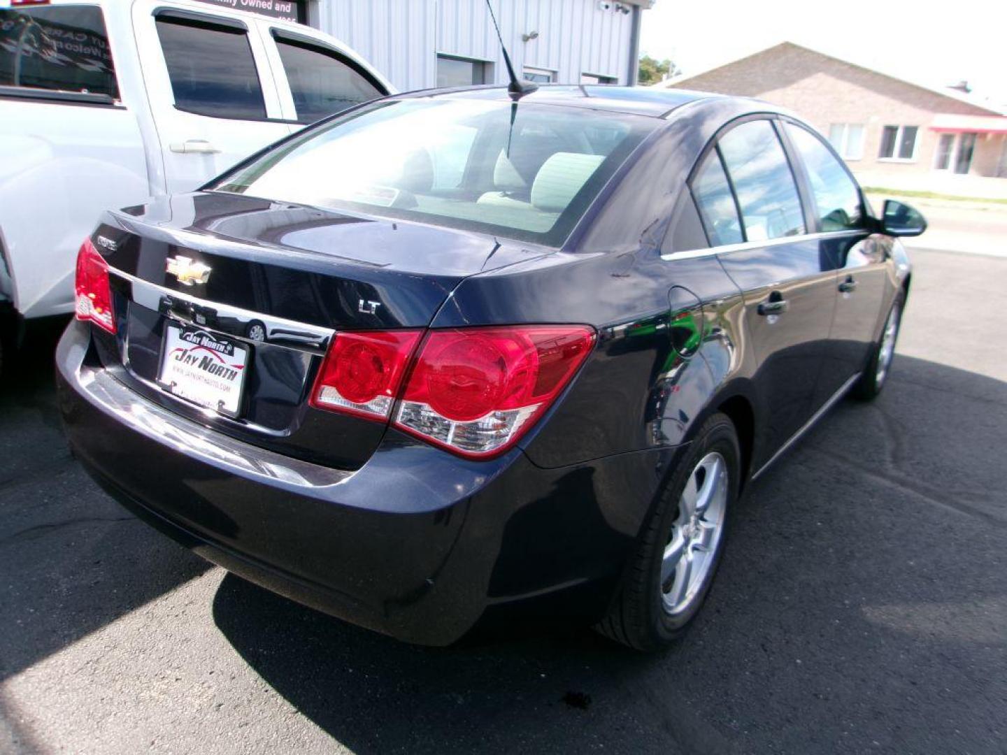 2014 BLUE CHEVROLET CRUZE LT (1G1PC5SB1E7) with an 1.4L engine, Automatic transmission, located at 501 E. Columbia St., Springfield, OH, 45503, (800) 262-7122, 39.925262, -83.801796 - ***Clean Carfax***1LT***Remote Start***New Front Brake Pads and Rotors***Serviced and Ready To Go*** Jay North Auto has offered hand picked vehicles since 1965! Our customer's enjoy a NO pressure buying experience with a small town feel. All of our vehicles get fully inspected and detailed. We - Photo#2