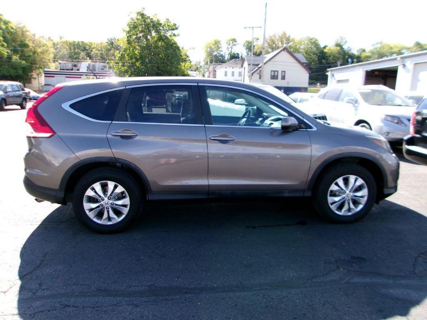 2014 BROWN HONDA CR-V EX (5J6RM4H50EL) with an 2.4L engine, Automatic transmission, located at 501 E. Columbia St., Springfield, OH, 45503, (800) 262-7122, 39.925262, -83.801796 - ***EX***AWD***New Front and Rear Brake Pads and Rotors***New Timing***Moonroof***Serviced and Ready To Go*** Jay North Auto has offered hand picked vehicles since 1965! Our customer's enjoy a NO pressure buying experience with a small town feel. All of our vehicles get fully inspected and deta - Photo#1
