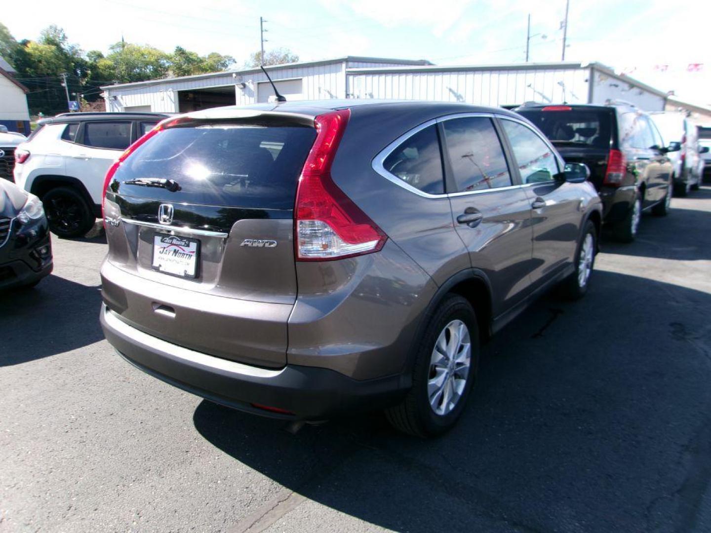 2014 BROWN HONDA CR-V EX (5J6RM4H50EL) with an 2.4L engine, Automatic transmission, located at 501 E. Columbia St., Springfield, OH, 45503, (800) 262-7122, 39.925262, -83.801796 - ***EX***AWD***New Front and Rear Brake Pads and Rotors***New Timing***Moonroof***Serviced and Ready To Go*** Jay North Auto has offered hand picked vehicles since 1965! Our customer's enjoy a NO pressure buying experience with a small town feel. All of our vehicles get fully inspected and deta - Photo#2
