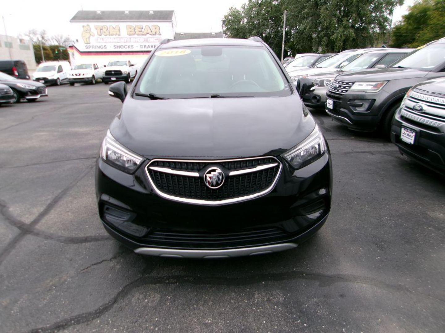 2018 BLACK BUICK ENCORE PREFERRED (KL4CJESB5JB) with an 1.4L engine, Automatic transmission, located at 501 E. Columbia St., Springfield, OH, 45503, (800) 262-7122, 39.925262, -83.801796 - ***New Tires***New Turbo***PREFERRED***AWD***New Spark Plugs***New Air Filter***New Cabin Air Filter***Detailed and Ready To Go!*** Jay North Auto has offered hand picked vehicles since 1965! Our customer's enjoy a NO pressure buying experience with a small town feel. All of our vehicles get f - Photo#1