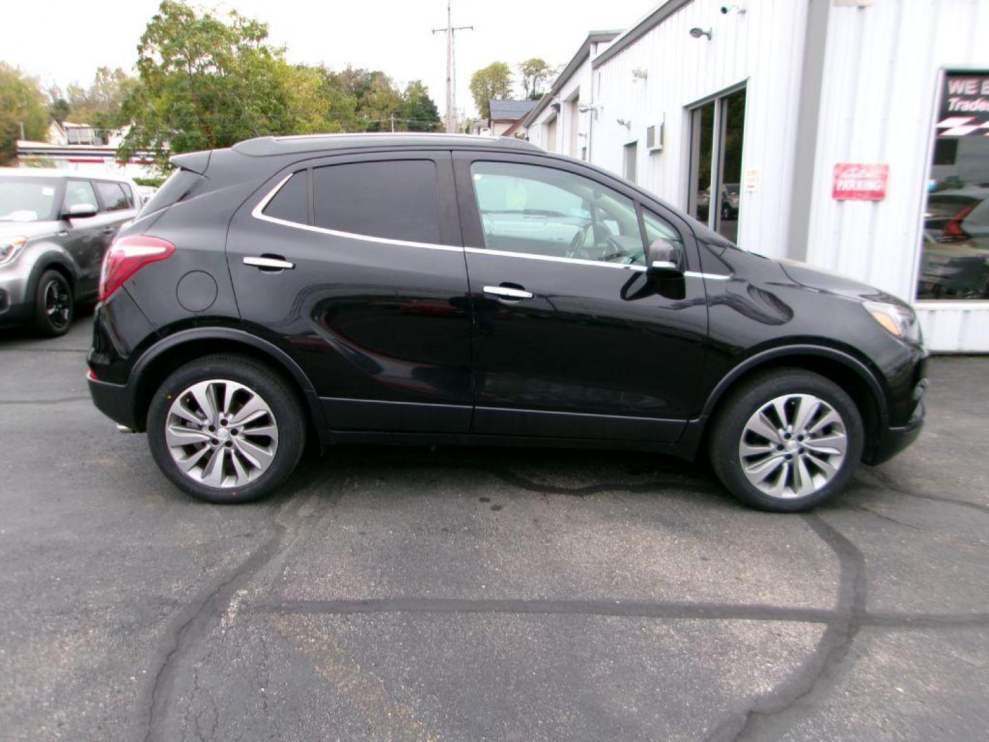 2018 BLACK BUICK ENCORE PREFERRED (KL4CJESB5JB) with an 1.4L engine, Automatic transmission, located at 501 E. Columbia St., Springfield, OH, 45503, (800) 262-7122, 39.925262, -83.801796 - ***New Tires***New Turbo***PREFERRED***AWD***New Spark Plugs***New Air Filter***New Cabin Air Filter***Detailed and Ready To Go!*** Jay North Auto has offered hand picked vehicles since 1965! Our customer's enjoy a NO pressure buying experience with a small town feel. All of our vehicles get f - Photo#2