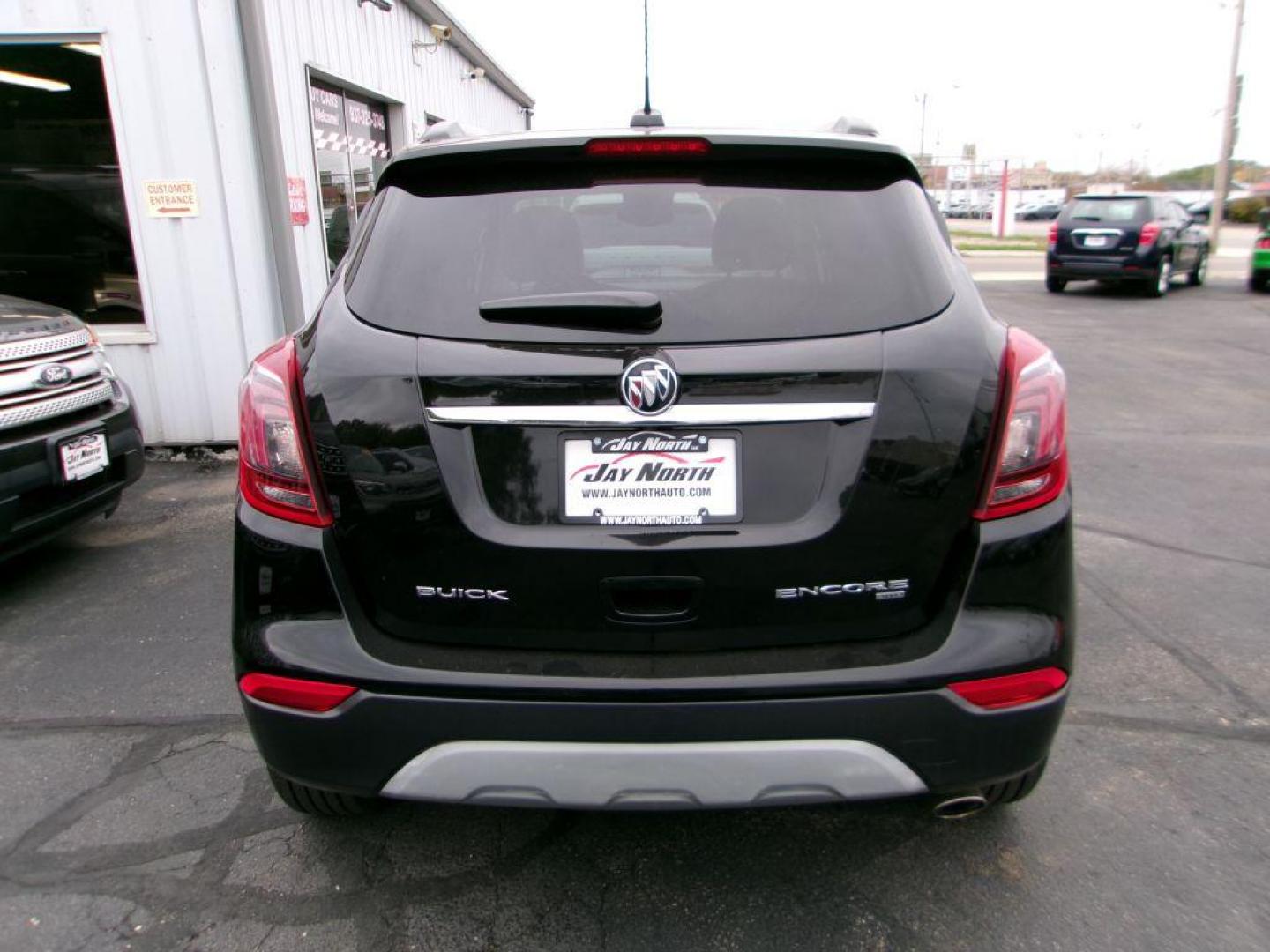 2018 BLACK BUICK ENCORE PREFERRED (KL4CJESB5JB) with an 1.4L engine, Automatic transmission, located at 501 E. Columbia St., Springfield, OH, 45503, (800) 262-7122, 39.925262, -83.801796 - ***New Tires***New Turbo***PREFERRED***AWD***New Spark Plugs***New Air Filter***New Cabin Air Filter***Detailed and Ready To Go!*** Jay North Auto has offered hand picked vehicles since 1965! Our customer's enjoy a NO pressure buying experience with a small town feel. All of our vehicles get f - Photo#4
