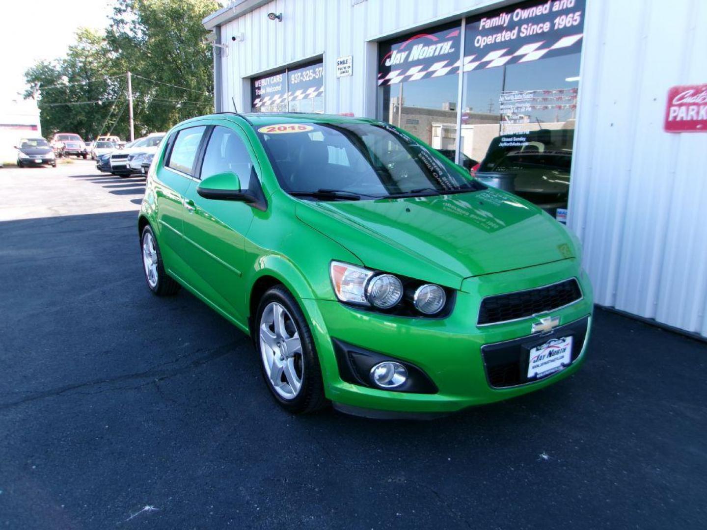 2015 GREEN CHEVROLET SONIC LTZ (1G1JE6SB1F4) with an 1.4L engine, Automatic transmission, located at 501 E. Columbia St., Springfield, OH, 45503, (800) 262-7122, 39.925262, -83.801796 - ***Clean Carfax***Regular Oil Changes***LTZ***Heated Leather Seats***Moonroof***New Front Brake Pads and Rotors***Detailed and Ready To Go*** Jay North Auto has offered hand picked vehicles since 1965! Our customer's enjoy a NO pressure buying experience with a small town feel. All of our vehi - Photo#0