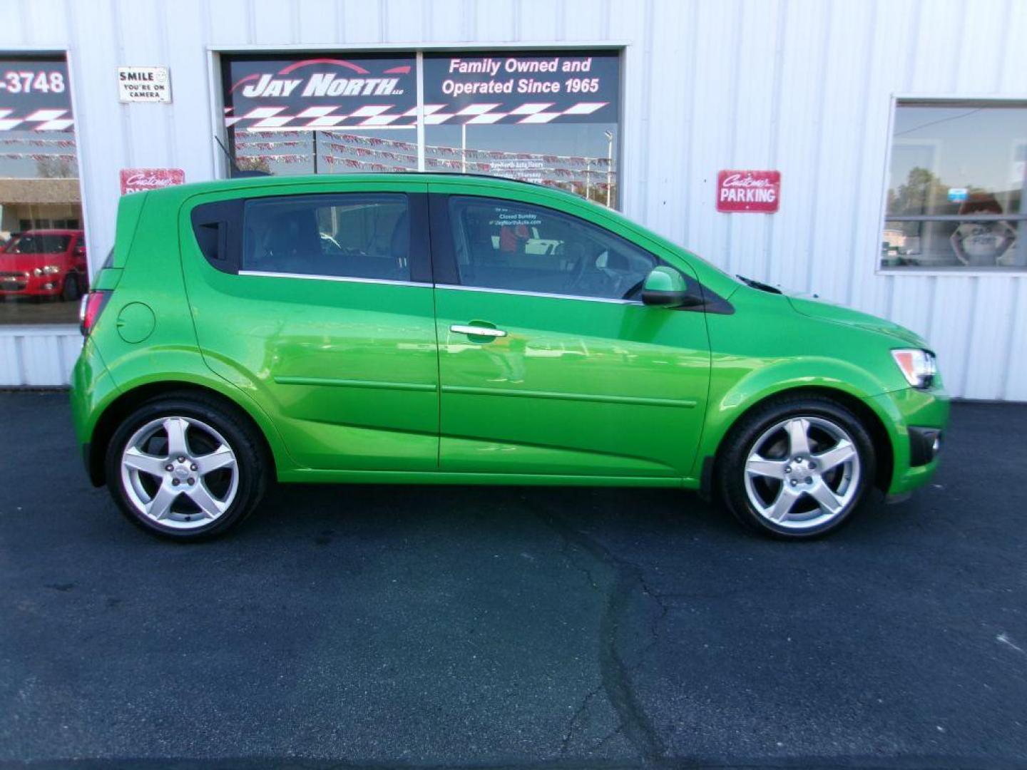 2015 GREEN CHEVROLET SONIC LTZ (1G1JE6SB1F4) with an 1.4L engine, Automatic transmission, located at 501 E. Columbia St., Springfield, OH, 45503, (800) 262-7122, 39.925262, -83.801796 - ***Clean Carfax***Regular Oil Changes***LTZ***Heated Leather Seats***Moonroof***New Front Brake Pads and Rotors***Detailed and Ready To Go*** Jay North Auto has offered hand picked vehicles since 1965! Our customer's enjoy a NO pressure buying experience with a small town feel. All of our vehi - Photo#2