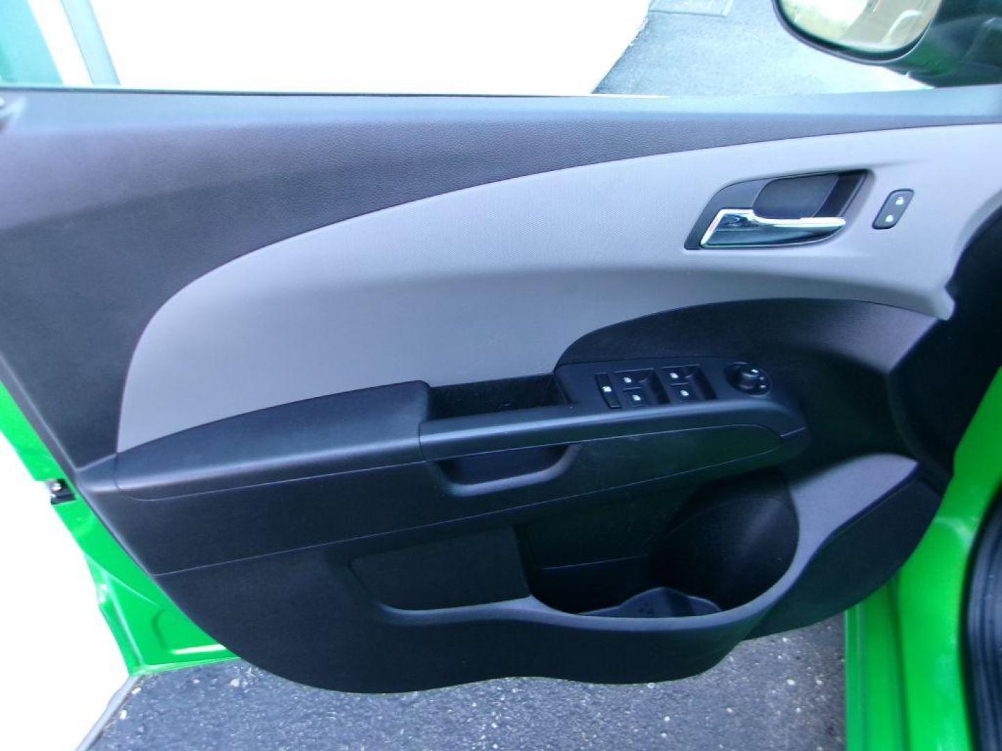 2015 GREEN CHEVROLET SONIC LTZ (1G1JE6SB1F4) with an 1.4L engine, Automatic transmission, located at 501 E. Columbia St., Springfield, OH, 45503, (800) 262-7122, 39.925262, -83.801796 - ***Clean Carfax***Regular Oil Changes***LTZ***Heated Leather Seats***Moonroof***New Front Brake Pads and Rotors***Detailed and Ready To Go*** Jay North Auto has offered hand picked vehicles since 1965! Our customer's enjoy a NO pressure buying experience with a small town feel. All of our vehi - Photo#7