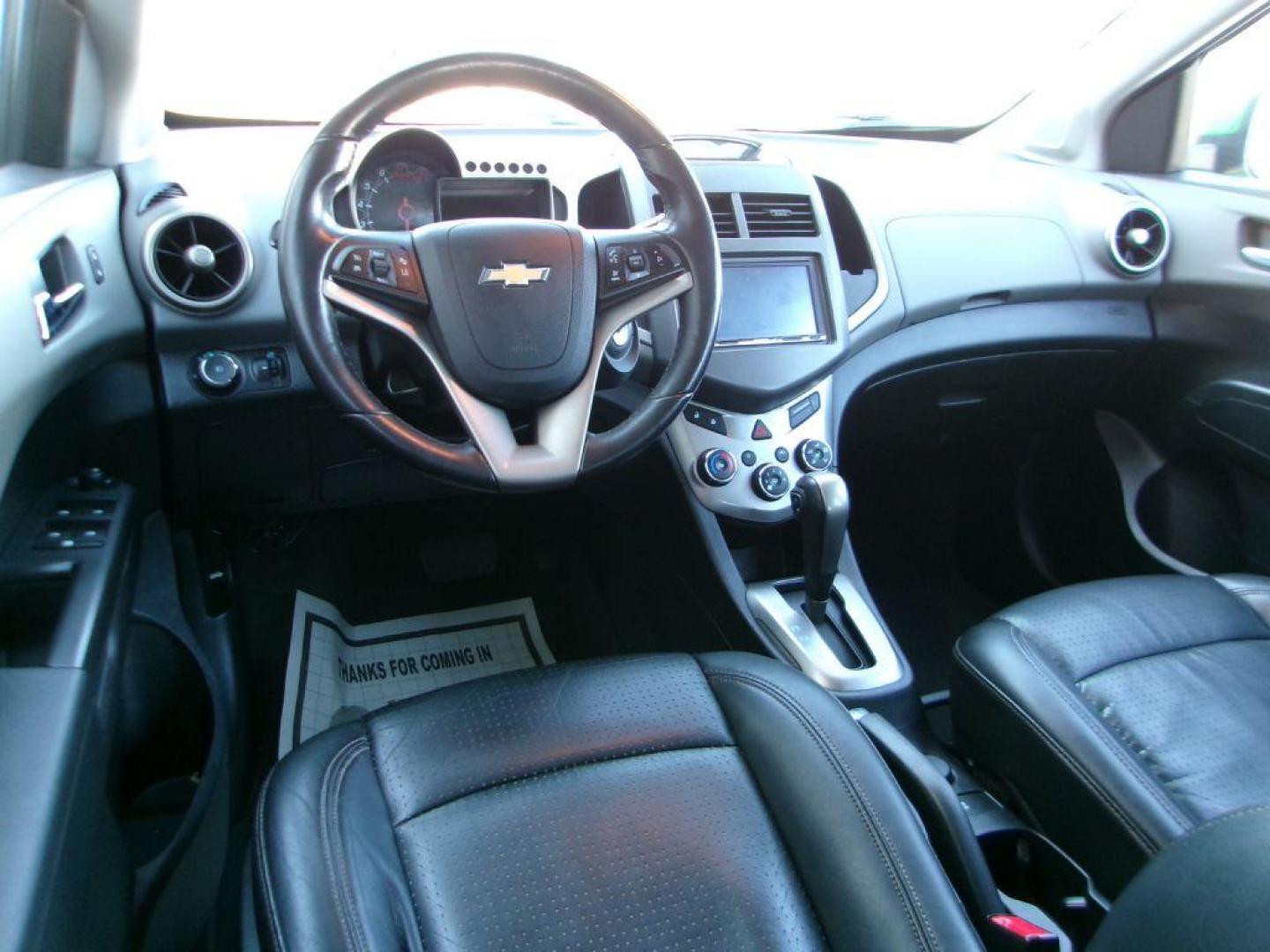 2015 GREEN CHEVROLET SONIC LTZ (1G1JE6SB1F4) with an 1.4L engine, Automatic transmission, located at 501 E. Columbia St., Springfield, OH, 45503, (800) 262-7122, 39.925262, -83.801796 - ***Clean Carfax***Regular Oil Changes***LTZ***Heated Leather Seats***Moonroof***New Front Brake Pads and Rotors***Detailed and Ready To Go*** Jay North Auto has offered hand picked vehicles since 1965! Our customer's enjoy a NO pressure buying experience with a small town feel. All of our vehi - Photo#10