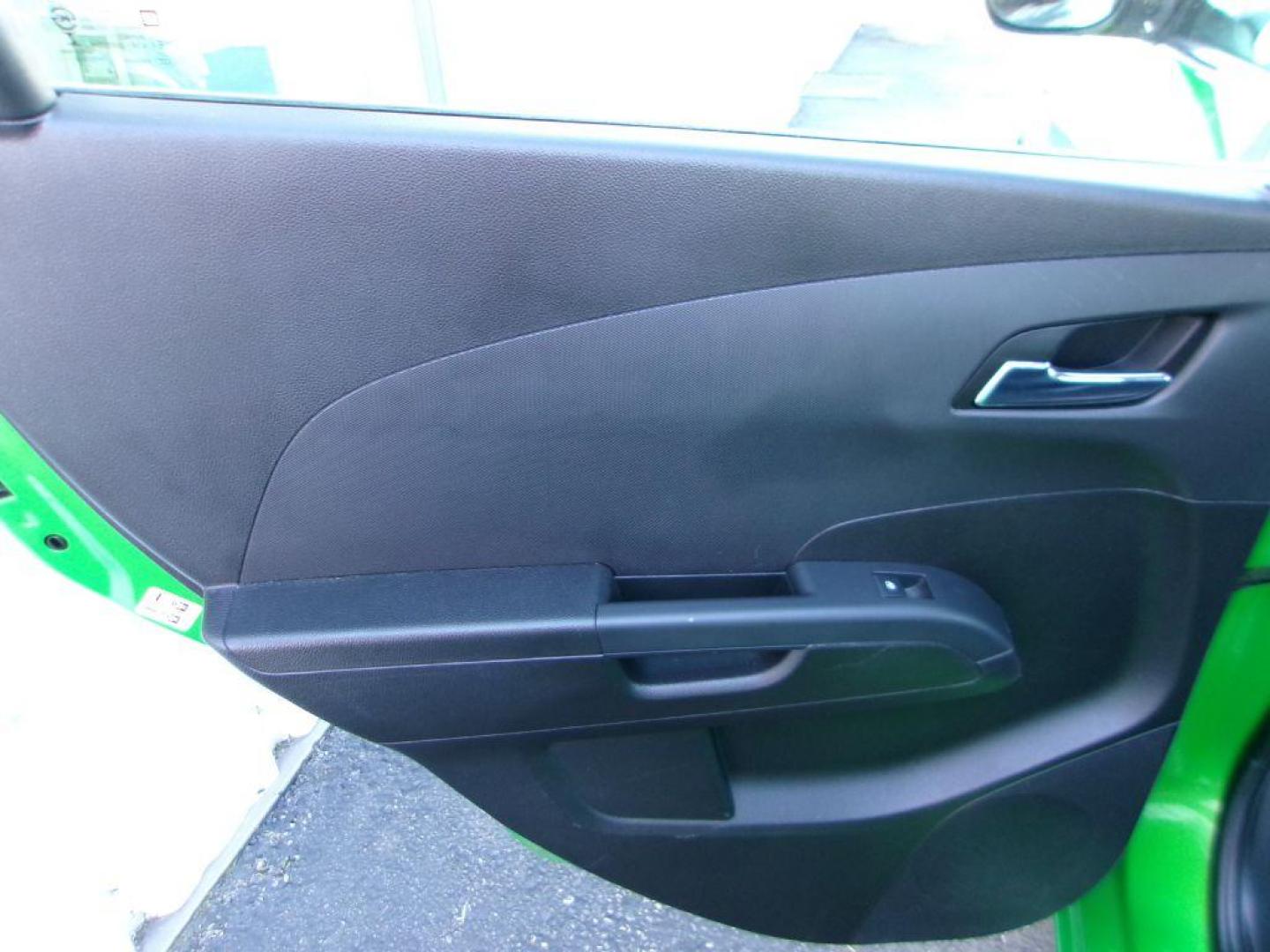 2015 GREEN CHEVROLET SONIC LTZ (1G1JE6SB1F4) with an 1.4L engine, Automatic transmission, located at 501 E. Columbia St., Springfield, OH, 45503, (800) 262-7122, 39.925262, -83.801796 - ***Clean Carfax***Regular Oil Changes***LTZ***Heated Leather Seats***Moonroof***New Front Brake Pads and Rotors***Detailed and Ready To Go*** Jay North Auto has offered hand picked vehicles since 1965! Our customer's enjoy a NO pressure buying experience with a small town feel. All of our vehi - Photo#11