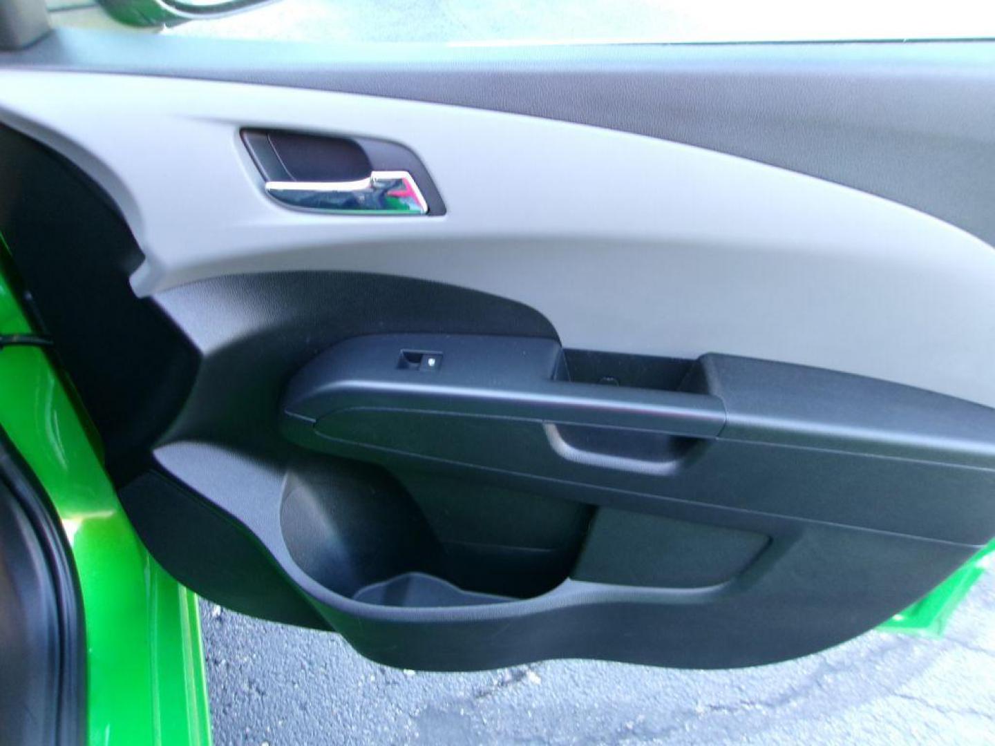 2015 GREEN CHEVROLET SONIC LTZ (1G1JE6SB1F4) with an 1.4L engine, Automatic transmission, located at 501 E. Columbia St., Springfield, OH, 45503, (800) 262-7122, 39.925262, -83.801796 - ***Clean Carfax***Regular Oil Changes***LTZ***Heated Leather Seats***Moonroof***New Front Brake Pads and Rotors***Detailed and Ready To Go*** Jay North Auto has offered hand picked vehicles since 1965! Our customer's enjoy a NO pressure buying experience with a small town feel. All of our vehi - Photo#16