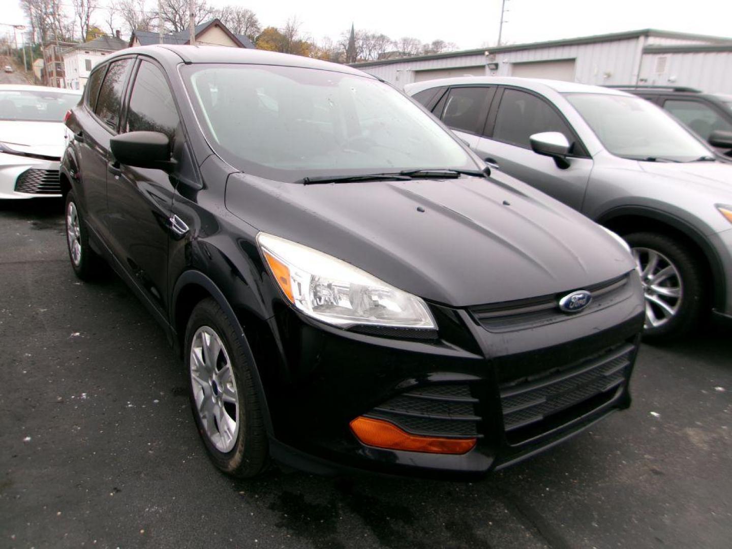 2016 BLACK FORD ESCAPE S (1FMCU0F7XGU) with an 2.5L engine, Automatic transmission, located at 501 E. Columbia St., Springfield, OH, 45503, (800) 262-7122, 39.925262, -83.801796 - ***Clean Carfax***S***New Front Brakes***New Wipers***New Air Filter and Cabin Filter***Detailed and Ready To Go*** Jay North Auto has offered hand picked vehicles since 1965! Our customer's enjoy a NO pressure buying experience with a small town feel. All of our vehicles get fully inspected a - Photo#0