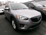 2014 SILVER MAZDA CX-5 GRAND TOURING (JM3KE4DY2E0) with an 2.5L engine, Automatic transmission, located at 501 E. Columbia St., Springfield, OH, 45503, (800) 262-7122, 39.925262, -83.801796 - ***1-Owner***Clean Carfax***New Front Brake Pads and Rotors***New Battery***New Spark Plugs***New Cabin Filter***AWD***Grand Touring***Detailed and Ready To Go*** Jay North Auto has offered hand picked vehicles since 1965! Our customer's enjoy a NO pressure buying experience with a small town - Photo#2