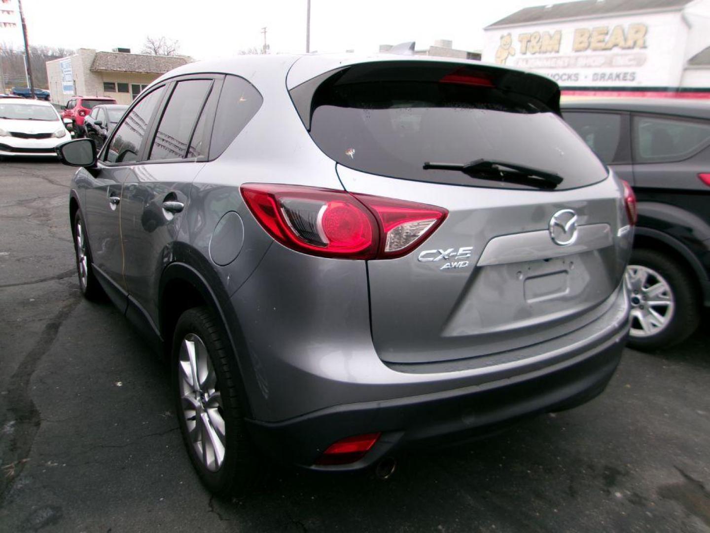 2014 SILVER MAZDA CX-5 GRAND TOURING (JM3KE4DY2E0) with an 2.5L engine, Automatic transmission, located at 501 E. Columbia St., Springfield, OH, 45503, (800) 262-7122, 39.925262, -83.801796 - ***1-Owner***Clean Carfax***New Front Brake Pads and Rotors***New Battery***New Spark Plugs***New Cabin Filter***AWD***Grand Touring***Detailed and Ready To Go*** Jay North Auto has offered hand picked vehicles since 1965! Our customer's enjoy a NO pressure buying experience with a small town - Photo#4