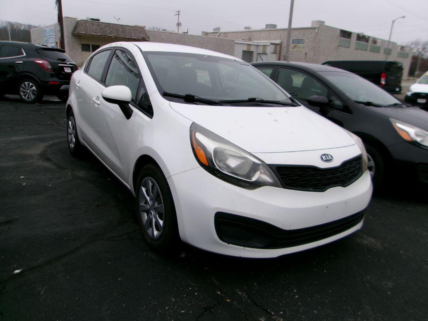 2013 WHITE KIA RIO LX (KNADM4A30D6) with an 1.6L engine, Automatic transmission, located at 501 E. Columbia St., Springfield, OH, 45503, (800) 262-7122, 39.925262, -83.801796 - Photo#0
