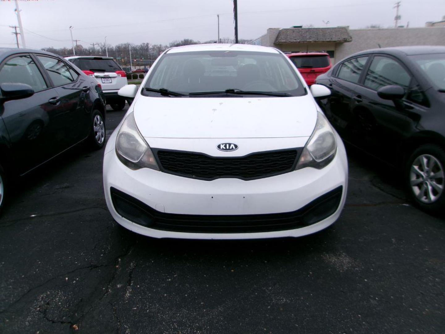 2013 WHITE KIA RIO LX (KNADM4A30D6) with an 1.6L engine, Automatic transmission, located at 501 E. Columbia St., Springfield, OH, 45503, (800) 262-7122, 39.925262, -83.801796 - Photo#1