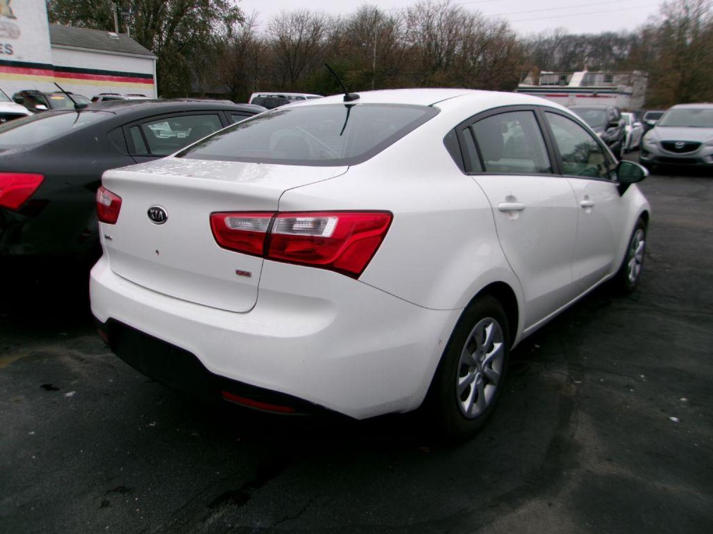 2013 WHITE KIA RIO LX (KNADM4A30D6) with an 1.6L engine, Automatic transmission, located at 501 E. Columbia St., Springfield, OH, 45503, (800) 262-7122, 39.925262, -83.801796 - Photo#2