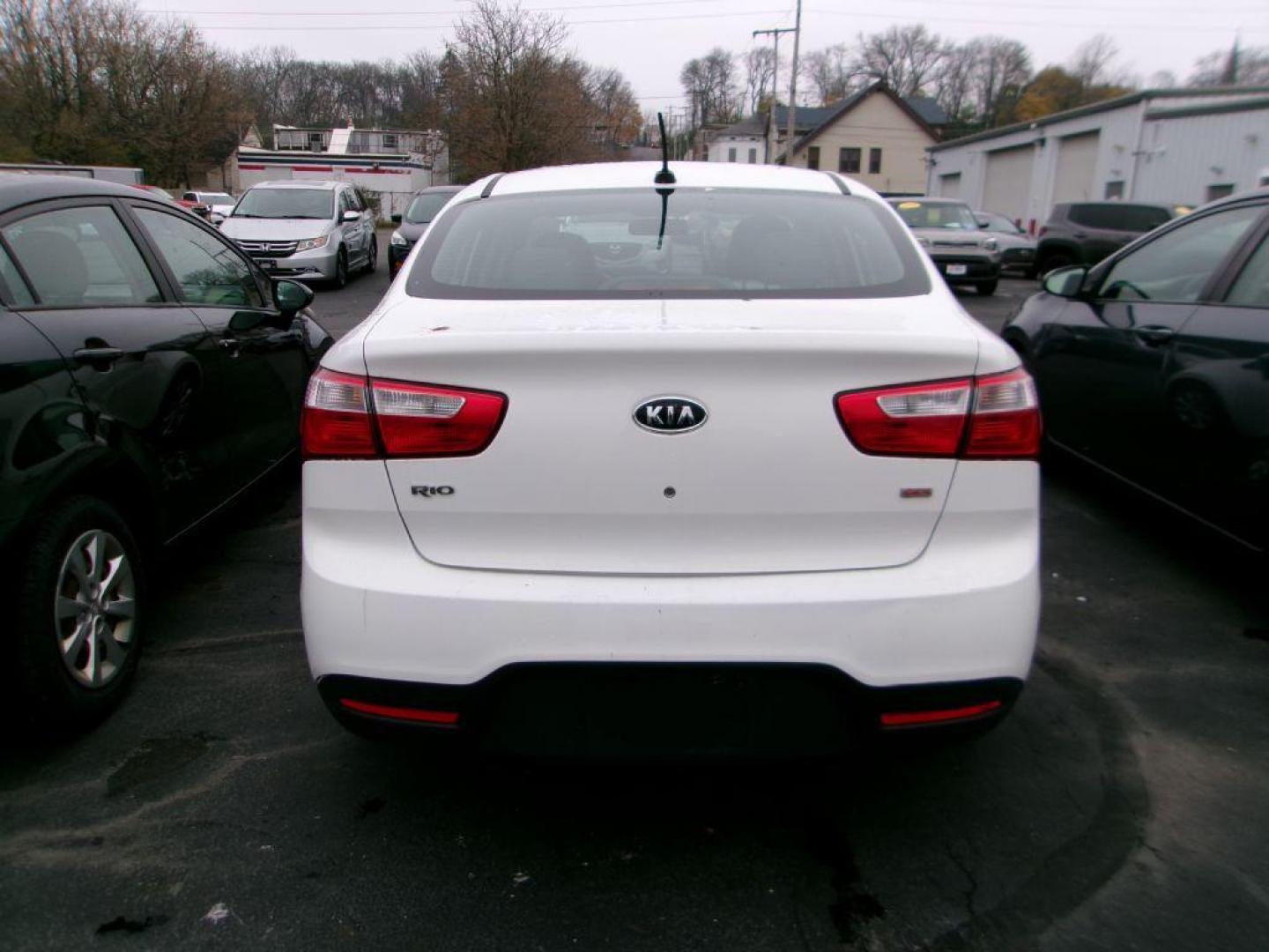 2013 WHITE KIA RIO LX (KNADM4A30D6) with an 1.6L engine, Automatic transmission, located at 501 E. Columbia St., Springfield, OH, 45503, (800) 262-7122, 39.925262, -83.801796 - Photo#3