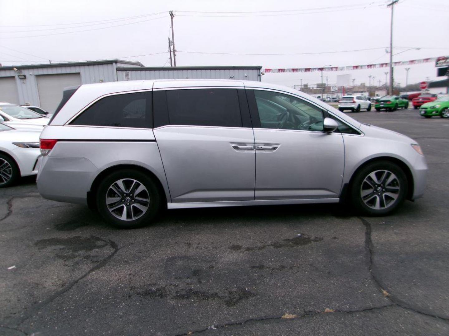 2015 SILVER HONDA ODYSSEY TOURING (5FNRL5H96FB) with an 3.5L engine, Automatic transmission, located at 501 E. Columbia St., Springfield, OH, 45503, (800) 262-7122, 39.925262, -83.801796 - ***Clean Carfax***New Front Brake Pads and Rotors***Touring Elite***New Timing***New Air Filter and Cabin Air Filter***Detailed and Ready To Go*** Jay North Auto has offered hand picked vehicles since 1965! Our customer's enjoy a NO pressure buying experience with a small town feel. We are a - Photo#2