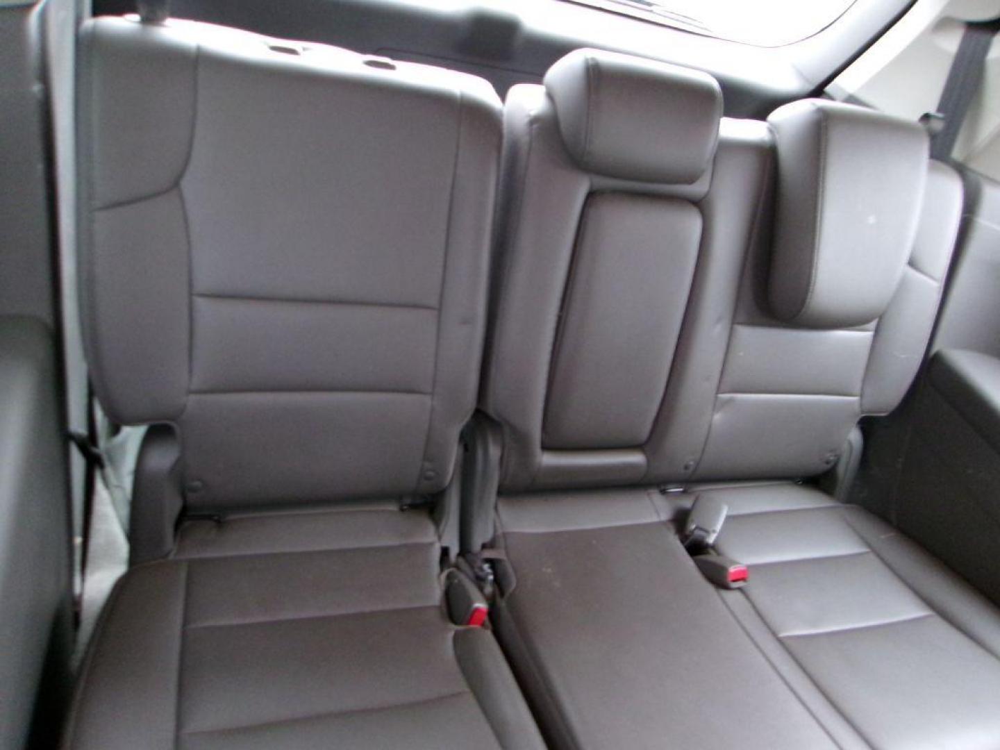 2015 SILVER HONDA ODYSSEY TOURING (5FNRL5H96FB) with an 3.5L engine, Automatic transmission, located at 501 E. Columbia St., Springfield, OH, 45503, (800) 262-7122, 39.925262, -83.801796 - ***Clean Carfax***New Front Brake Pads and Rotors***Touring Elite***New Timing***New Air Filter and Cabin Air Filter***Detailed and Ready To Go*** Jay North Auto has offered hand picked vehicles since 1965! Our customer's enjoy a NO pressure buying experience with a small town feel. We are a - Photo#14