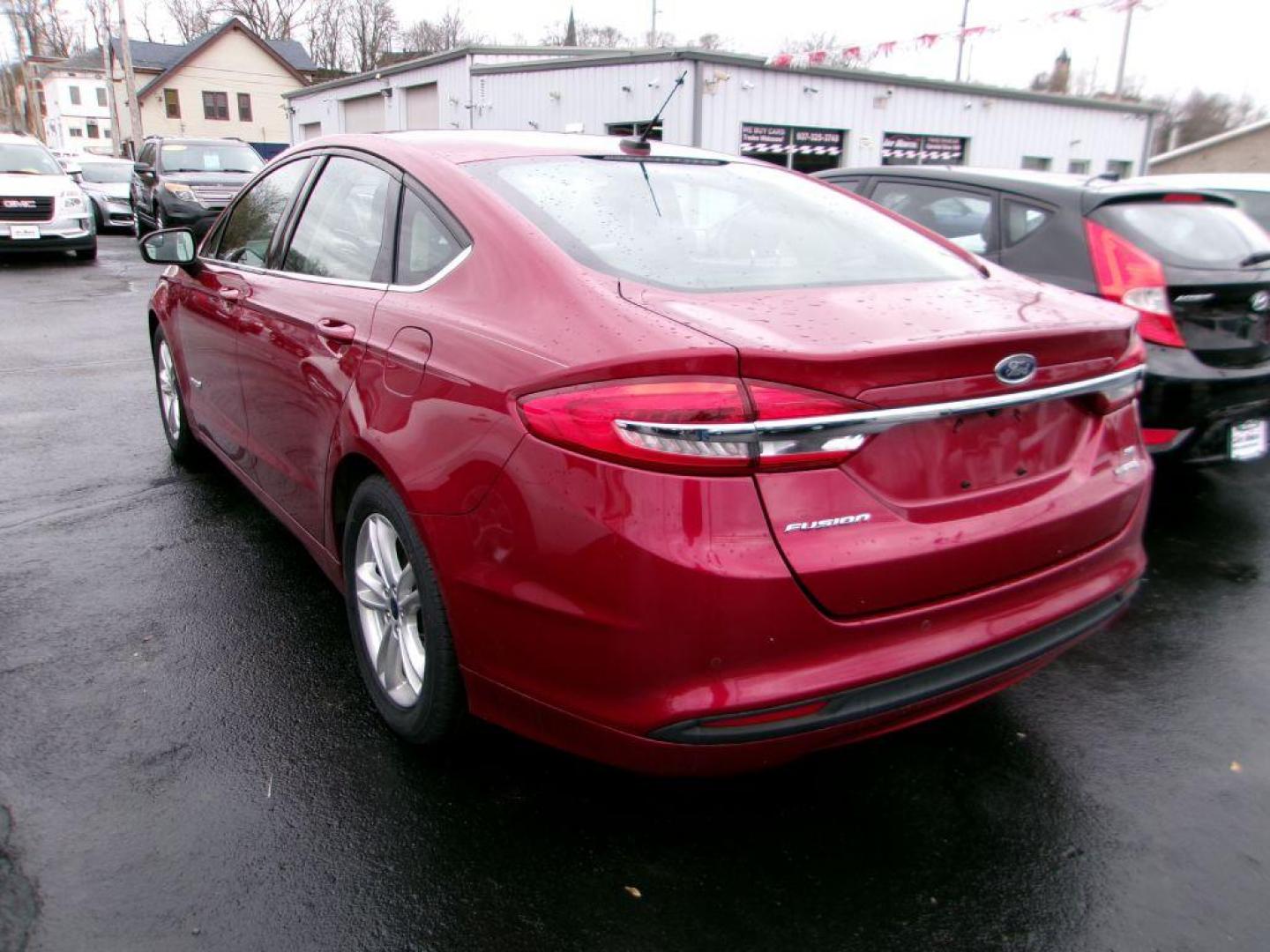 2018 RED FORD FUSION SE HYBRID (3FA6P0LU3JR) with an 2.0L engine, Continuously Variable transmission, located at 501 E. Columbia St., Springfield, OH, 45503, (800) 262-7122, 39.925262, -83.801796 - ***Clean Carfax***New Tires***New Front and Rear Brakes***New Air Filter and Cabin Air Filter***New Wiper Blades***HYBRID***Heated Seats***Fresh Oil Change***Ready To Go*** Jay North Auto has offered hand picked vehicles since 1965! Our customer's enjoy a NO pressure buying experience with a s - Photo#4