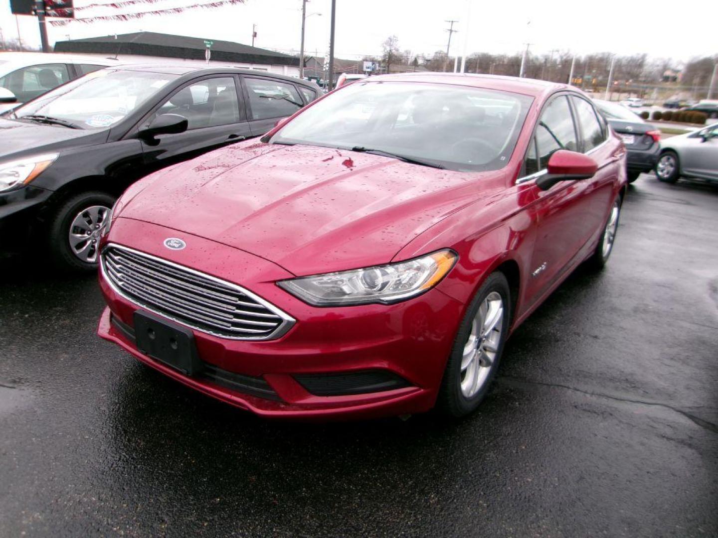 2018 RED FORD FUSION SE HYBRID (3FA6P0LU3JR) with an 2.0L engine, Continuously Variable transmission, located at 501 E. Columbia St., Springfield, OH, 45503, (800) 262-7122, 39.925262, -83.801796 - ***Clean Carfax***New Tires***New Front and Rear Brakes***New Air Filter and Cabin Air Filter***New Wiper Blades***HYBRID***Heated Seats***Fresh Oil Change***Ready To Go*** Jay North Auto has offered hand picked vehicles since 1965! Our customer's enjoy a NO pressure buying experience with a s - Photo#5