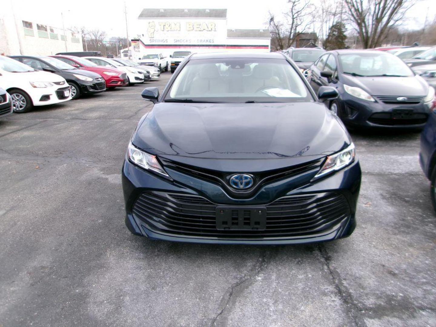 2020 BLUE TOYOTA CAMRY LE (4T1L31AK5LU) with an 2.5L engine, Continuously Variable transmission, located at 501 E. Columbia St., Springfield, OH, 45503, (800) 262-7122, 39.925262, -83.801796 - *** Hybrid *** LE *** 33 Service Records on CarFax *** Lane Assit *** Blind Spot *** Radar Cruise *** Touch Screen w/ CarPlay *** NICE!!!*** Jay North Auto has offered hand picked vehicles since 1965! Our customer's enjoy a NO pressure buying experience with a small town feel. We are a preferr - Photo#1