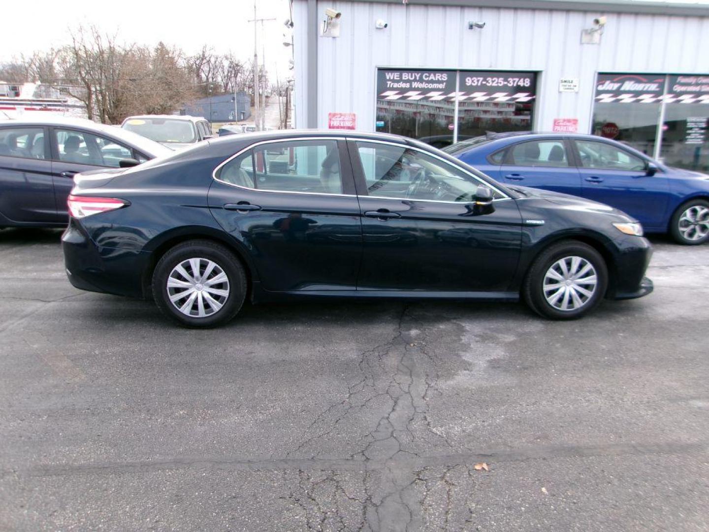 2020 BLUE TOYOTA CAMRY LE (4T1L31AK5LU) with an 2.5L engine, Continuously Variable transmission, located at 501 E. Columbia St., Springfield, OH, 45503, (800) 262-7122, 39.925262, -83.801796 - *** Hybrid *** LE *** 33 Service Records on CarFax *** Lane Assit *** Blind Spot *** Radar Cruise *** Touch Screen w/ CarPlay *** NICE!!!*** Jay North Auto has offered hand picked vehicles since 1965! Our customer's enjoy a NO pressure buying experience with a small town feel. We are a preferr - Photo#2