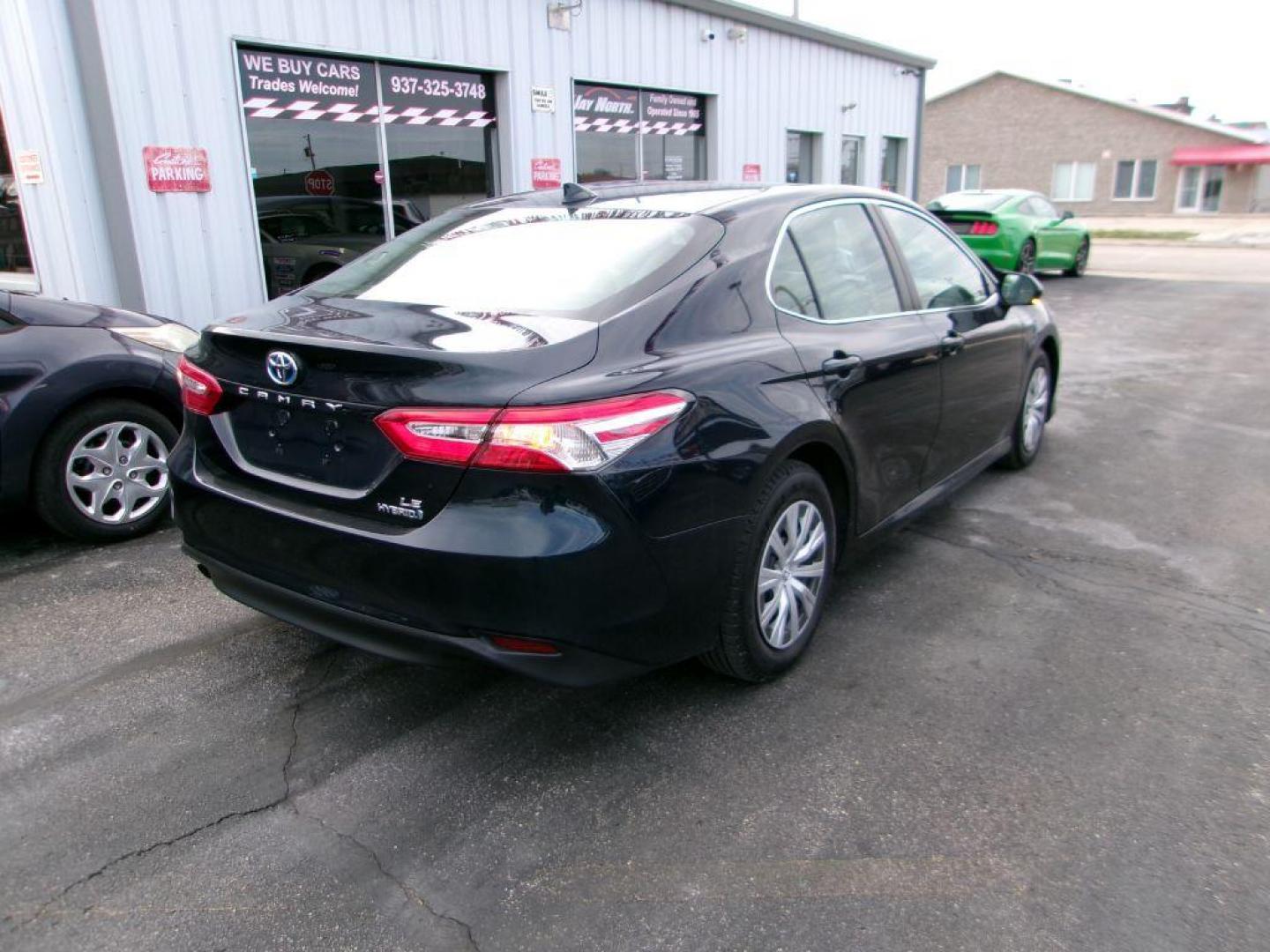 2020 BLUE TOYOTA CAMRY LE (4T1L31AK5LU) with an 2.5L engine, Continuously Variable transmission, located at 501 E. Columbia St., Springfield, OH, 45503, (800) 262-7122, 39.925262, -83.801796 - *** Hybrid *** LE *** 33 Service Records on CarFax *** Lane Assit *** Blind Spot *** Radar Cruise *** Touch Screen w/ CarPlay *** NICE!!!*** Jay North Auto has offered hand picked vehicles since 1965! Our customer's enjoy a NO pressure buying experience with a small town feel. We are a preferr - Photo#3