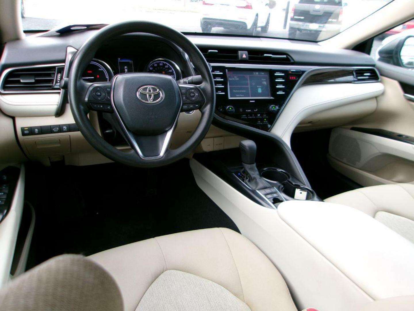 2020 BLUE TOYOTA CAMRY LE (4T1L31AK5LU) with an 2.5L engine, Continuously Variable transmission, located at 501 E. Columbia St., Springfield, OH, 45503, (800) 262-7122, 39.925262, -83.801796 - *** Hybrid *** LE *** 33 Service Records on CarFax *** Lane Assit *** Blind Spot *** Radar Cruise *** Touch Screen w/ CarPlay *** NICE!!!*** Jay North Auto has offered hand picked vehicles since 1965! Our customer's enjoy a NO pressure buying experience with a small town feel. We are a preferr - Photo#9