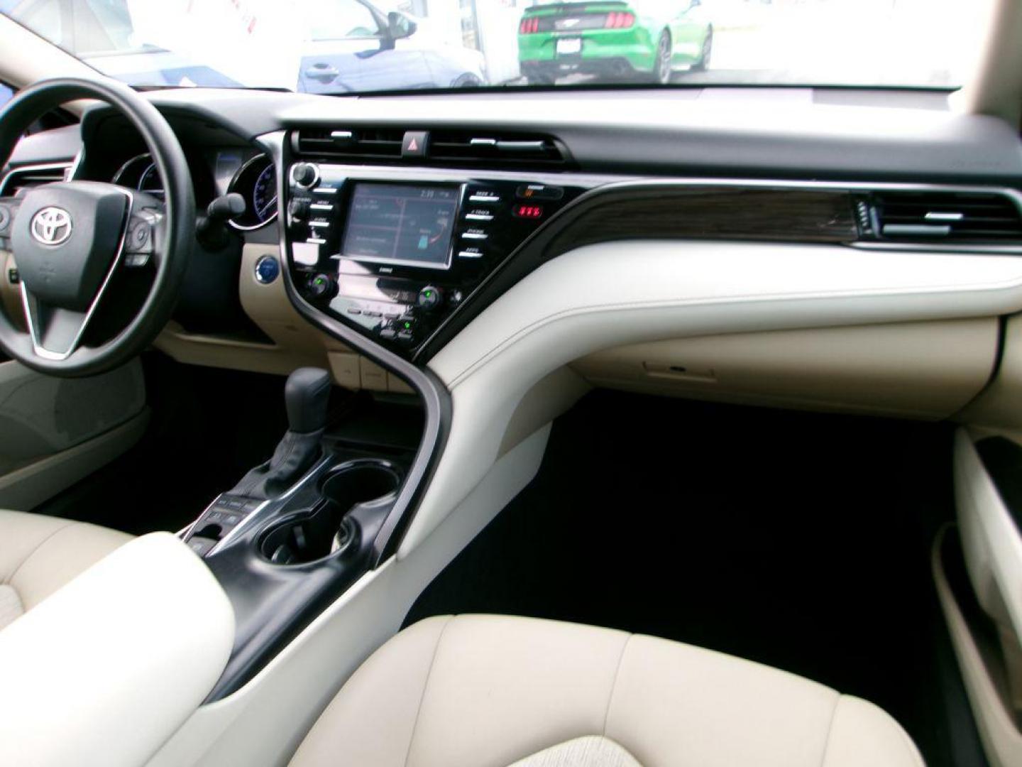 2020 BLUE TOYOTA CAMRY LE (4T1L31AK5LU) with an 2.5L engine, Continuously Variable transmission, located at 501 E. Columbia St., Springfield, OH, 45503, (800) 262-7122, 39.925262, -83.801796 - *** Hybrid *** LE *** 33 Service Records on CarFax *** Lane Assit *** Blind Spot *** Radar Cruise *** Touch Screen w/ CarPlay *** NICE!!!*** Jay North Auto has offered hand picked vehicles since 1965! Our customer's enjoy a NO pressure buying experience with a small town feel. We are a preferr - Photo#17