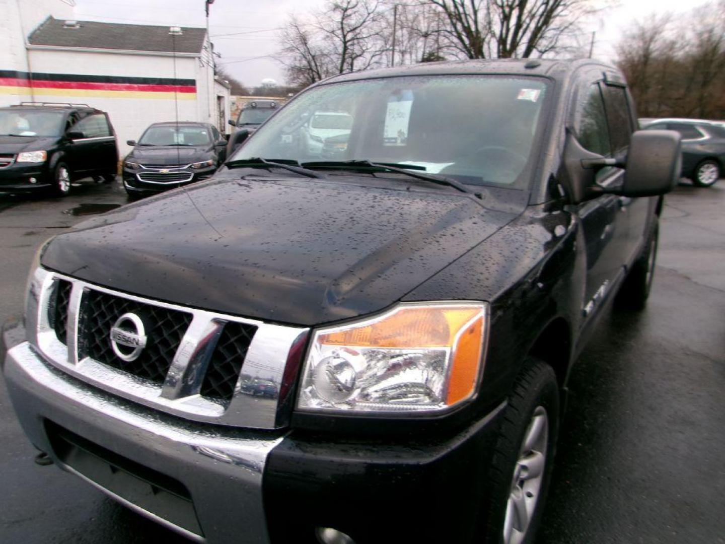 2011 BLACK NISSAN TITAN SV (1N6AA0EC4BN) with an 5.6L engine, Automatic transmission, located at 501 E. Columbia St., Springfield, OH, 45503, (800) 262-7122, 39.925262, -83.801796 - *** SV *** 4WD *** 5.6L V8 *** Crew Cab *** New Brakes *** New Air and Cabin Filter *** Nice!!! *** Jay North Auto has offered hand picked vehicles since 1965! Our customer's enjoy a NO pressure buying experience with a small town feel. We are a preferred dealer for many local credit unions an - Photo#2