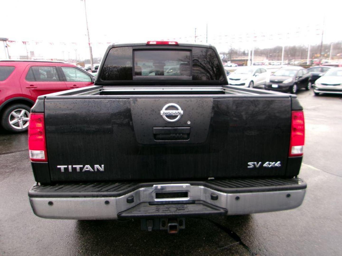 2011 BLACK NISSAN TITAN SV (1N6AA0EC4BN) with an 5.6L engine, Automatic transmission, located at 501 E. Columbia St., Springfield, OH, 45503, (800) 262-7122, 39.925262, -83.801796 - *** SV *** 4WD *** 5.6L V8 *** Crew Cab *** New Brakes *** New Air and Cabin Filter *** Nice!!! *** Jay North Auto has offered hand picked vehicles since 1965! Our customer's enjoy a NO pressure buying experience with a small town feel. We are a preferred dealer for many local credit unions an - Photo#3