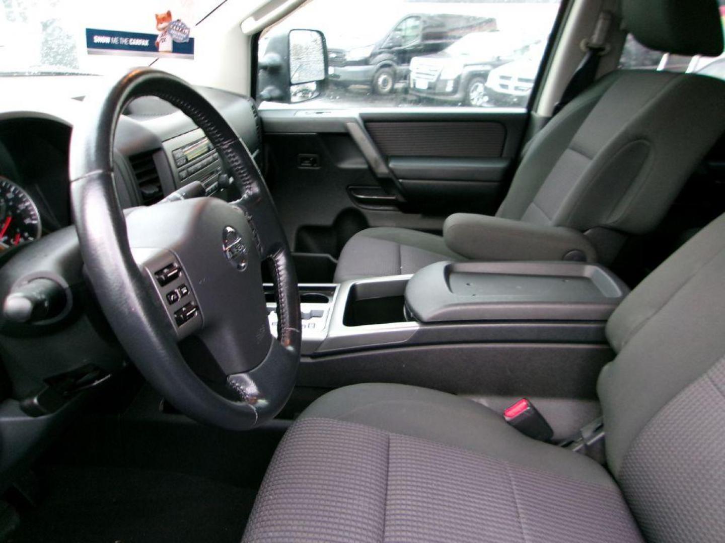 2011 BLACK NISSAN TITAN SV (1N6AA0EC4BN) with an 5.6L engine, Automatic transmission, located at 501 E. Columbia St., Springfield, OH, 45503, (800) 262-7122, 39.925262, -83.801796 - *** SV *** 4WD *** 5.6L V8 *** Crew Cab *** New Brakes *** New Air and Cabin Filter *** Nice!!! *** Jay North Auto has offered hand picked vehicles since 1965! Our customer's enjoy a NO pressure buying experience with a small town feel. We are a preferred dealer for many local credit unions an - Photo#8