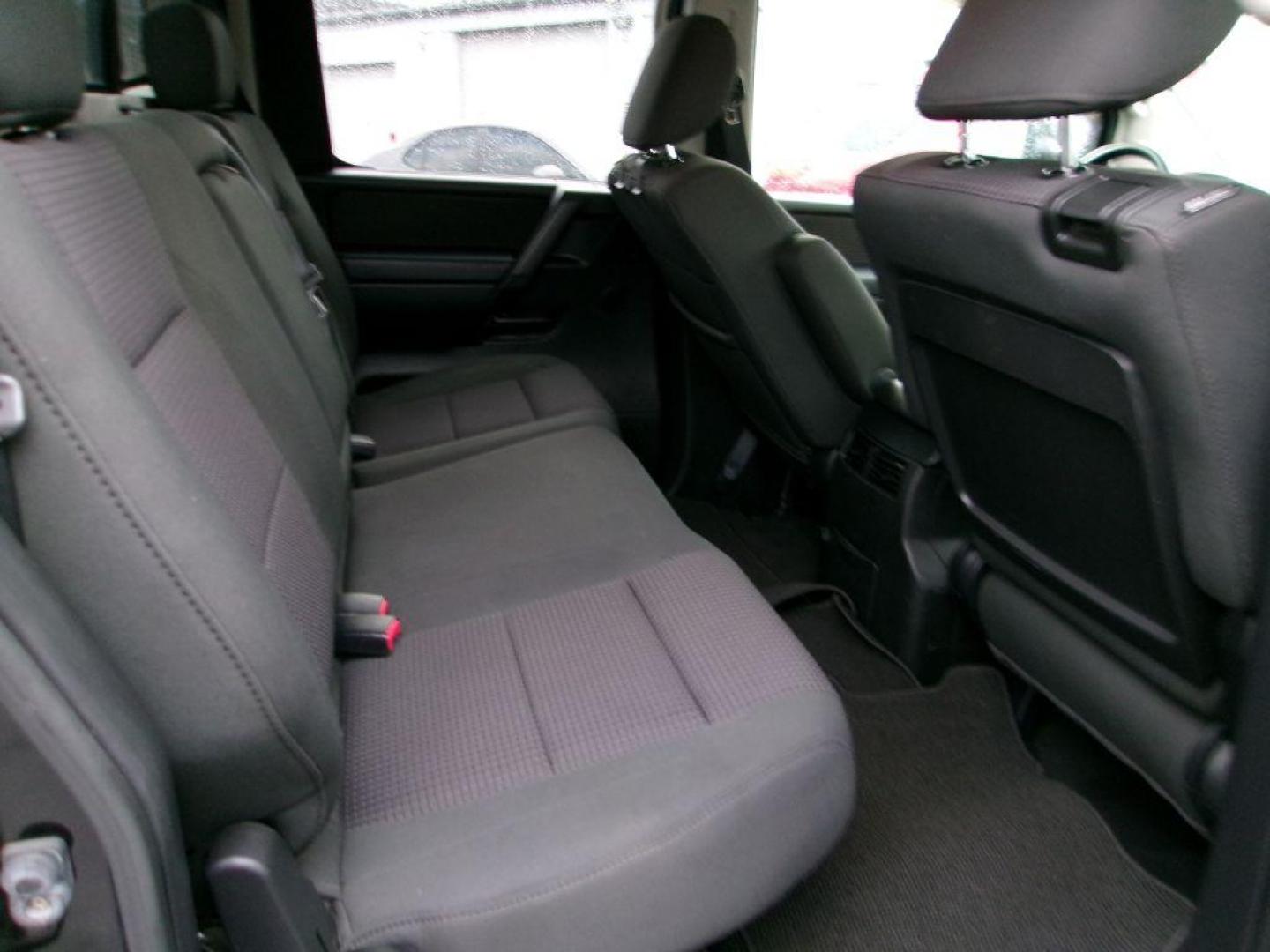 2011 BLACK NISSAN TITAN SV (1N6AA0EC4BN) with an 5.6L engine, Automatic transmission, located at 501 E. Columbia St., Springfield, OH, 45503, (800) 262-7122, 39.925262, -83.801796 - *** SV *** 4WD *** 5.6L V8 *** Crew Cab *** New Brakes *** New Air and Cabin Filter *** Nice!!! *** Jay North Auto has offered hand picked vehicles since 1965! Our customer's enjoy a NO pressure buying experience with a small town feel. We are a preferred dealer for many local credit unions an - Photo#10