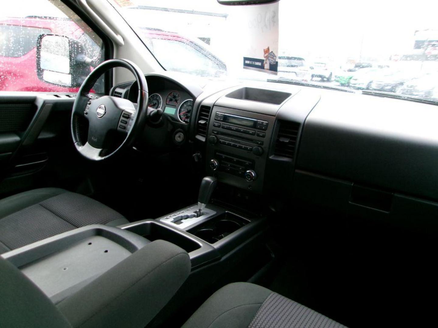 2011 BLACK NISSAN TITAN SV (1N6AA0EC4BN) with an 5.6L engine, Automatic transmission, located at 501 E. Columbia St., Springfield, OH, 45503, (800) 262-7122, 39.925262, -83.801796 - *** SV *** 4WD *** 5.6L V8 *** Crew Cab *** New Brakes *** New Air and Cabin Filter *** Nice!!! *** Jay North Auto has offered hand picked vehicles since 1965! Our customer's enjoy a NO pressure buying experience with a small town feel. We are a preferred dealer for many local credit unions an - Photo#11