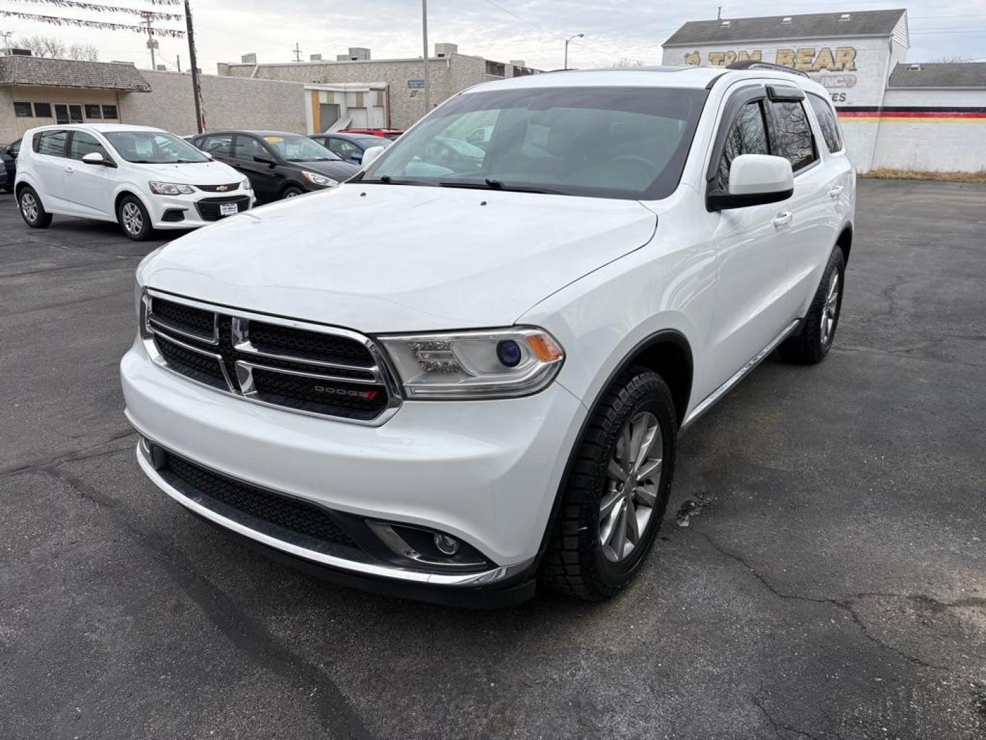 2017 WHITE DODGE DURANGO SXT (1C4RDJAG1HC) with an 3.6L engine, Automatic transmission, located at 501 E. Columbia St., Springfield, OH, 45503, (800) 262-7122, 39.925262, -83.801796 - *** Clean CarFax w/ 18 Service Records *** New Tires *** New Rear Shocks *** New Air and Cabin Filter *** Moonroof *** Tow Package *** Heated Seats and Steering Wheel *** 3rd row seating *** All Wheel Drive *** Park Assist w/ Back Up Camera *** Jay North Auto has offered hand picked vehicles sin - Photo#5