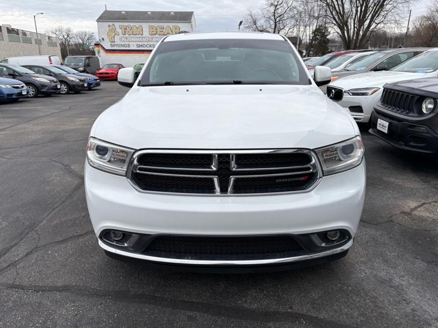 2017 WHITE DODGE DURANGO SXT (1C4RDJAG1HC) with an 3.6L engine, Automatic transmission, located at 501 E. Columbia St., Springfield, OH, 45503, (800) 262-7122, 39.925262, -83.801796 - *** Clean CarFax w/ 18 Service Records *** New Tires *** New Rear Shocks *** New Air and Cabin Filter *** Moonroof *** Tow Package *** Heated Seats and Steering Wheel *** 3rd row seating *** All Wheel Drive *** Park Assist w/ Back Up Camera *** Jay North Auto has offered hand picked vehicles sin - Photo#6