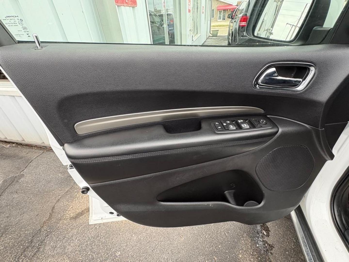 2017 WHITE DODGE DURANGO SXT (1C4RDJAG1HC) with an 3.6L engine, Automatic transmission, located at 501 E. Columbia St., Springfield, OH, 45503, (800) 262-7122, 39.925262, -83.801796 - *** Clean CarFax w/ 18 Service Records *** New Tires *** New Rear Shocks *** New Air and Cabin Filter *** Moonroof *** Tow Package *** Heated Seats and Steering Wheel *** 3rd row seating *** All Wheel Drive *** Park Assist w/ Back Up Camera *** Jay North Auto has offered hand picked vehicles sin - Photo#7