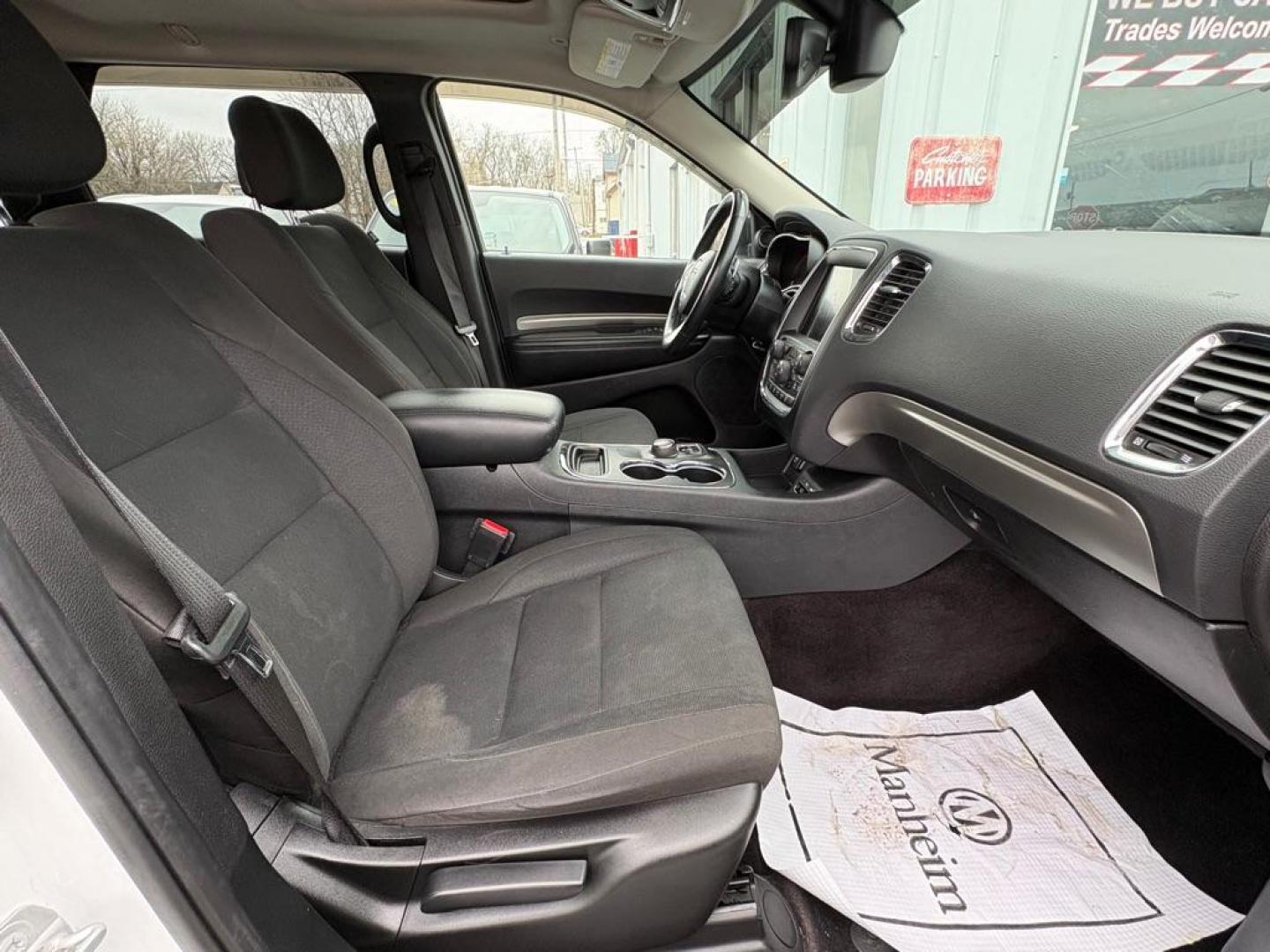 2017 WHITE DODGE DURANGO SXT (1C4RDJAG1HC) with an 3.6L engine, Automatic transmission, located at 501 E. Columbia St., Springfield, OH, 45503, (800) 262-7122, 39.925262, -83.801796 - *** Clean CarFax w/ 18 Service Records *** New Tires *** New Rear Shocks *** New Air and Cabin Filter *** Moonroof *** Tow Package *** Heated Seats and Steering Wheel *** 3rd row seating *** All Wheel Drive *** Park Assist w/ Back Up Camera *** Jay North Auto has offered hand picked vehicles sin - Photo#18