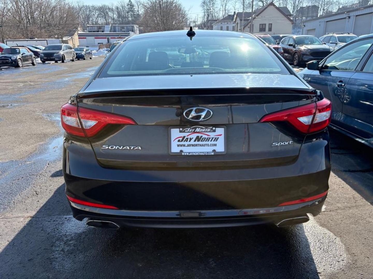 2017 BLACK HYUNDAI SONATA SPORT (5NPE34AF8HH) with an 2.4L engine, Automatic transmission, located at 501 E. Columbia St., Springfield, OH, 45503, (800) 262-7122, 39.925262, -83.801796 - ***Clean Carfax***New Tires***All New Brake Pads and Rotors***New Spark Plugs***New Serpentine Belt***Heated Leather Seating***Moonroof***Fresh Oil Change*** Jay North Auto has offered hand picked vehicles since 1965! Our customer's enjoy a NO pressure buying experience with a small town feel. - Photo#2