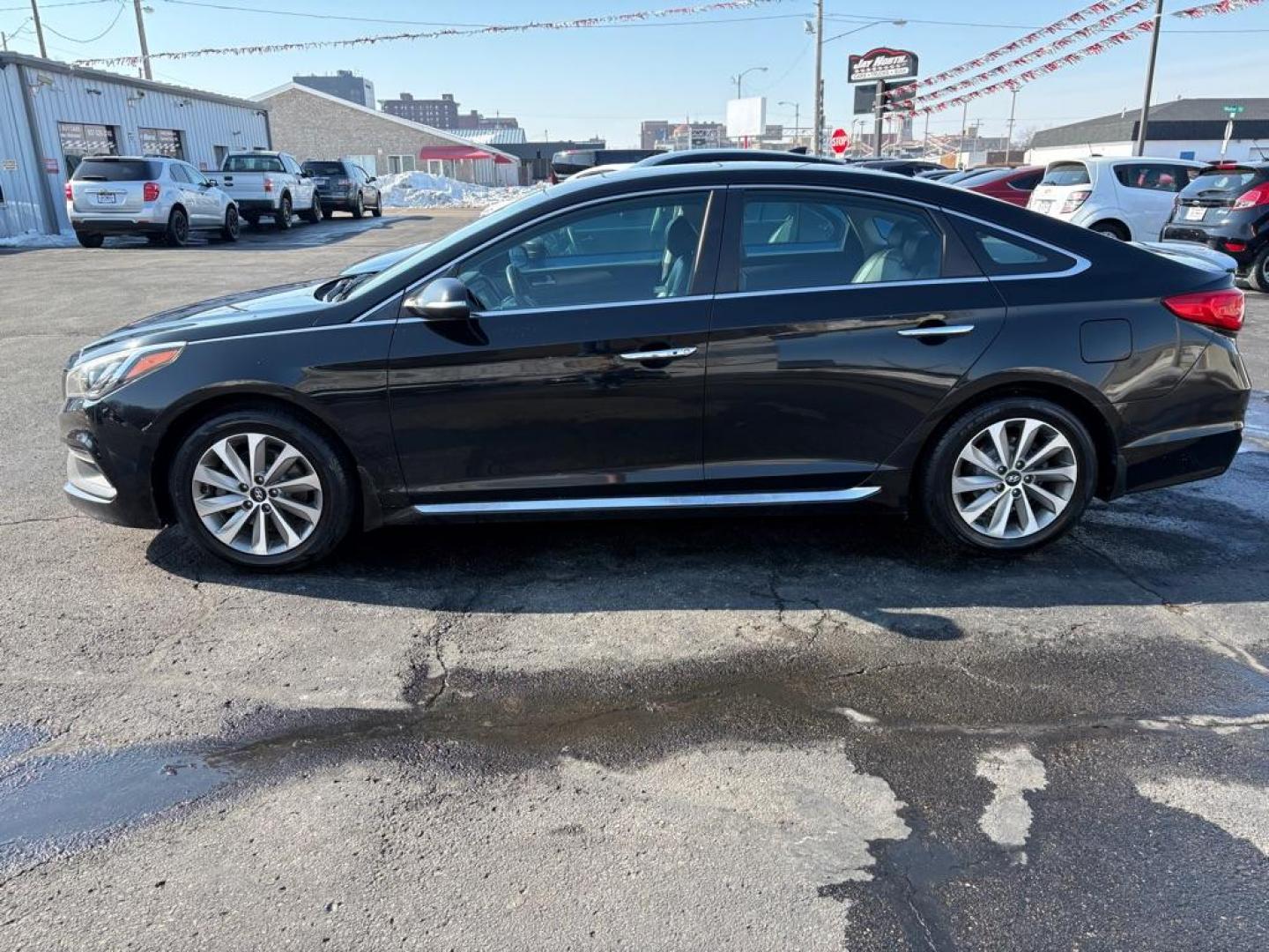 2017 BLACK HYUNDAI SONATA SPORT (5NPE34AF8HH) with an 2.4L engine, Automatic transmission, located at 501 E. Columbia St., Springfield, OH, 45503, (800) 262-7122, 39.925262, -83.801796 - ***Clean Carfax***New Tires***All New Brake Pads and Rotors***New Spark Plugs***New Serpentine Belt***Heated Leather Seating***Moonroof***Fresh Oil Change*** Jay North Auto has offered hand picked vehicles since 1965! Our customer's enjoy a NO pressure buying experience with a small town feel. - Photo#4