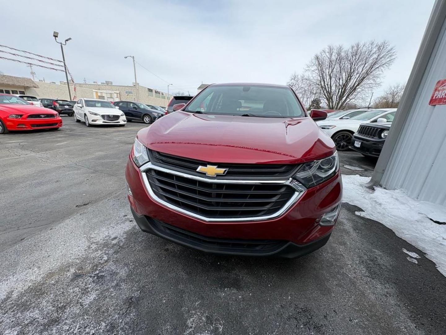 2018 RED CHEVROLET EQUINOX LT (2GNAXJEV8J6) with an 1.5L engine, Automatic transmission, located at 501 E. Columbia St., Springfield, OH, 45503, (800) 262-7122, 39.925262, -83.801796 - *** LT *** Remote Start *** New Oil and Filter *** New Cabin and Air filter *** New Brakes *** New TPMS Sensors *** Back Up Camera *** Jay North Auto has offered hand picked vehicles since 1965! Our customer's enjoy a NO pressure buying experience with a small town feel. We are a preferred de - Photo#6