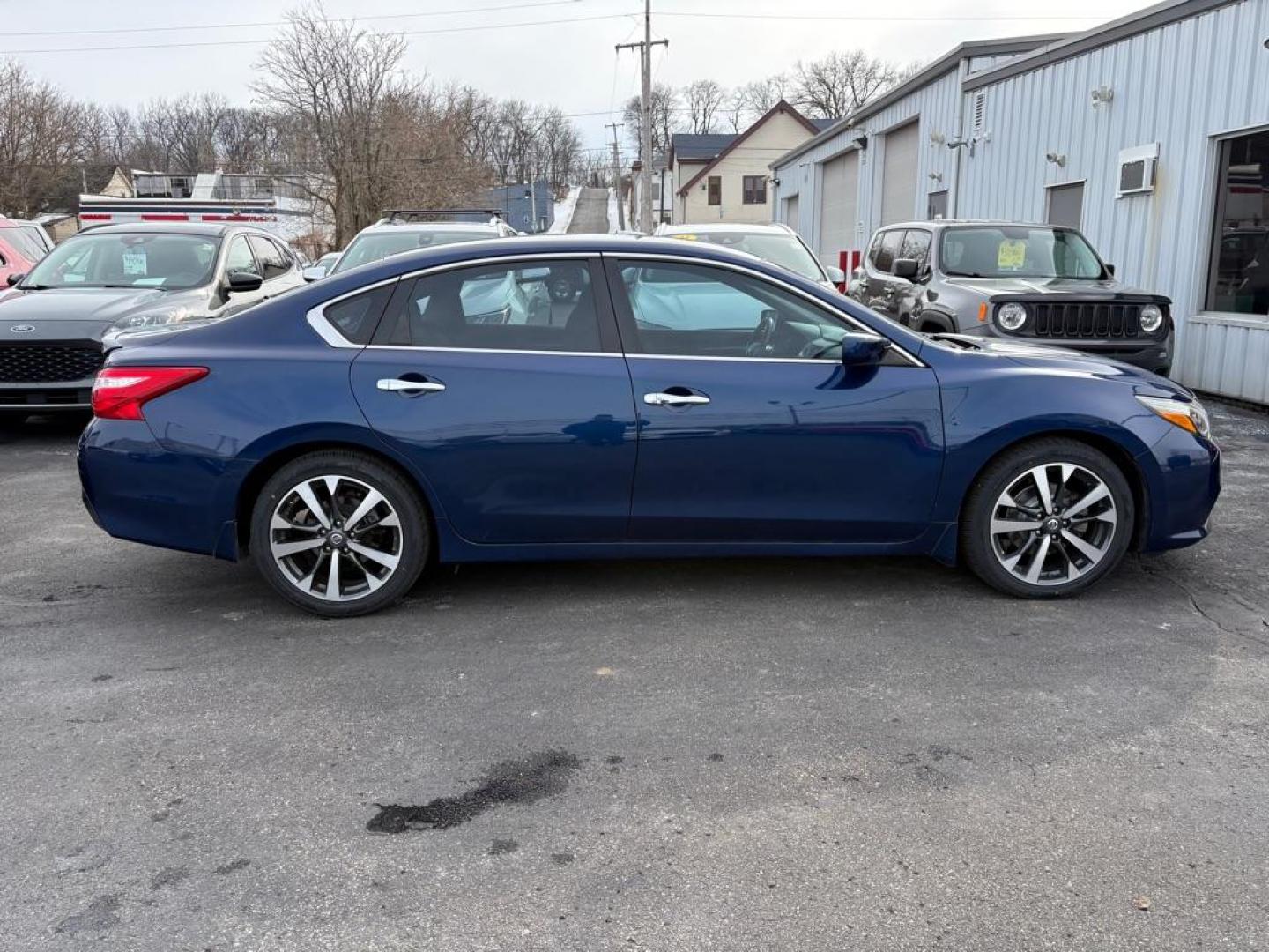 2016 BLUE NISSAN ALTIMA 2.5 SR (1N4AL3AP6GC) with an 2.5L engine, Continuously Variable transmission, located at 501 E. Columbia St., Springfield, OH, 45503, (800) 262-7122, 39.925262, -83.801796 - *** SR *** New Tires *** Tune Up *** New Brakes *** New Battery *** New O2 sensors *** New Wipers *** New Cabin and Air filter *** 19 Service Records on clean CarFax *** Jay North Auto has offered hand picked vehicles since 1965! Our customer's enjoy a NO pressure buying experience with a small - Photo#1