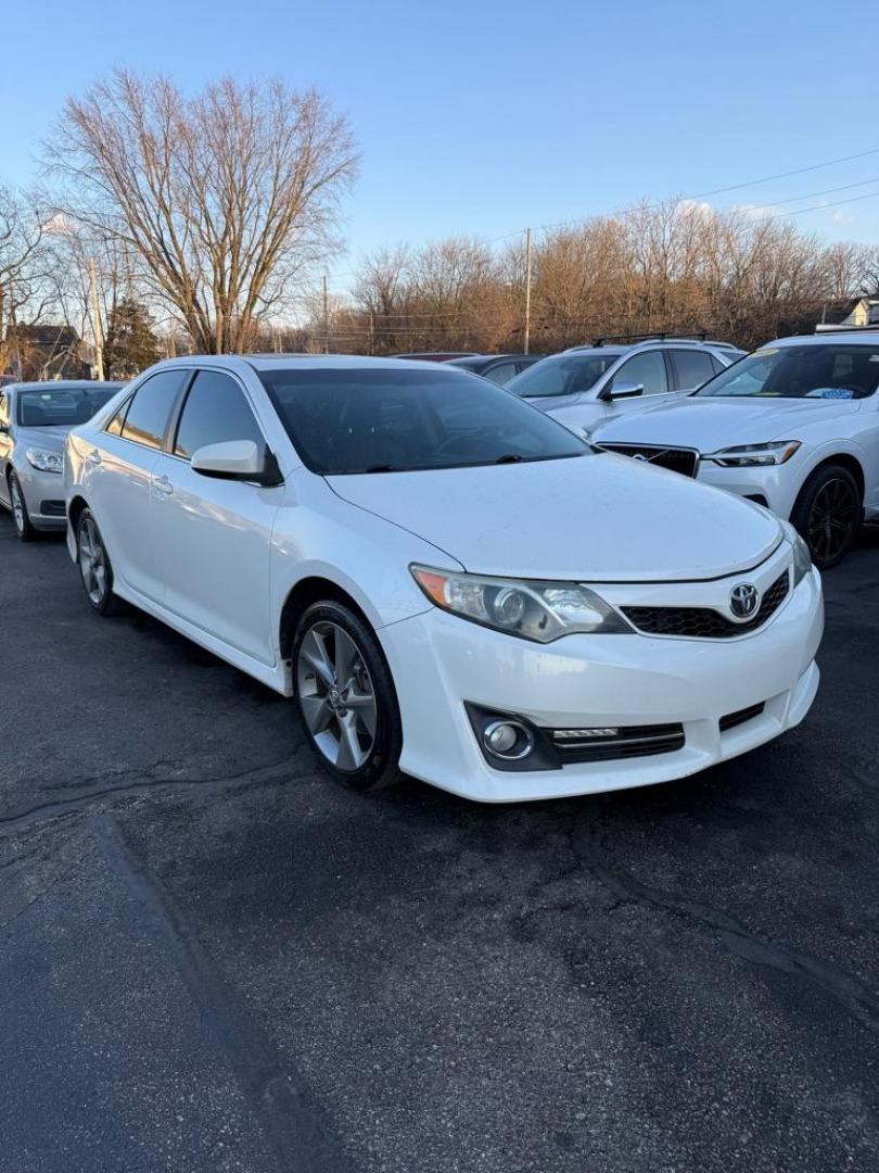 2014 WHITE TOYOTA CAMRY SE SPORT (4T1BF1FK5EU) with an 2.5L engine, Automatic transmission, located at 501 E. Columbia St., Springfield, OH, 45503, (800) 262-7122, 39.925262, -83.801796 - ***SE SPORT***New Front Brake Pads and Rotors***New Air Filter and Cabin Air Filter***Sunroof***Fresh Oil Change*** Jay North Auto has offered hand picked vehicles since 1965! Our customer's enjoy a NO pressure buying experience with a small town feel. We are a preferred dealer for many local - Photo#0