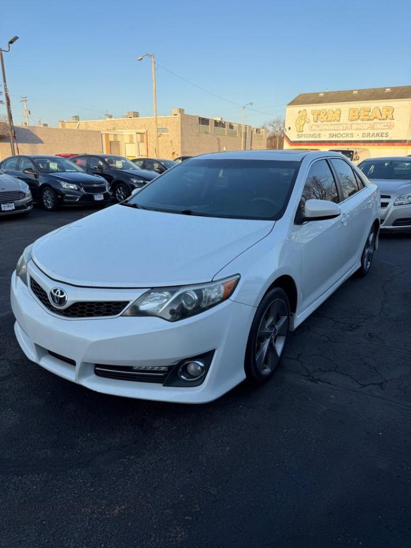 2014 WHITE TOYOTA CAMRY SE SPORT (4T1BF1FK5EU) with an 2.5L engine, Automatic transmission, located at 501 E. Columbia St., Springfield, OH, 45503, (800) 262-7122, 39.925262, -83.801796 - ***SE SPORT***New Front Brake Pads and Rotors***New Air Filter and Cabin Air Filter***Sunroof***Fresh Oil Change*** Jay North Auto has offered hand picked vehicles since 1965! Our customer's enjoy a NO pressure buying experience with a small town feel. We are a preferred dealer for many local - Photo#2