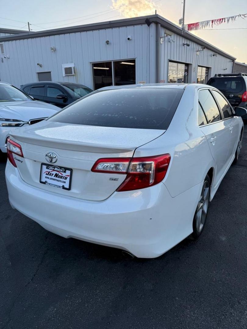 2014 WHITE TOYOTA CAMRY SE SPORT (4T1BF1FK5EU) with an 2.5L engine, Automatic transmission, located at 501 E. Columbia St., Springfield, OH, 45503, (800) 262-7122, 39.925262, -83.801796 - ***SE SPORT***New Front Brake Pads and Rotors***New Air Filter and Cabin Air Filter***Sunroof***Fresh Oil Change*** Jay North Auto has offered hand picked vehicles since 1965! Our customer's enjoy a NO pressure buying experience with a small town feel. We are a preferred dealer for many local - Photo#6