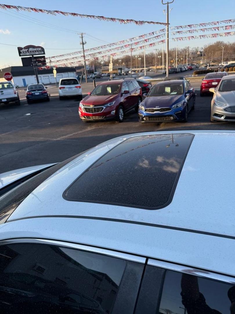 2014 WHITE TOYOTA CAMRY SE SPORT (4T1BF1FK5EU) with an 2.5L engine, Automatic transmission, located at 501 E. Columbia St., Springfield, OH, 45503, (800) 262-7122, 39.925262, -83.801796 - ***SE SPORT***New Front Brake Pads and Rotors***New Air Filter and Cabin Air Filter***Sunroof***Fresh Oil Change*** Jay North Auto has offered hand picked vehicles since 1965! Our customer's enjoy a NO pressure buying experience with a small town feel. We are a preferred dealer for many local - Photo#10
