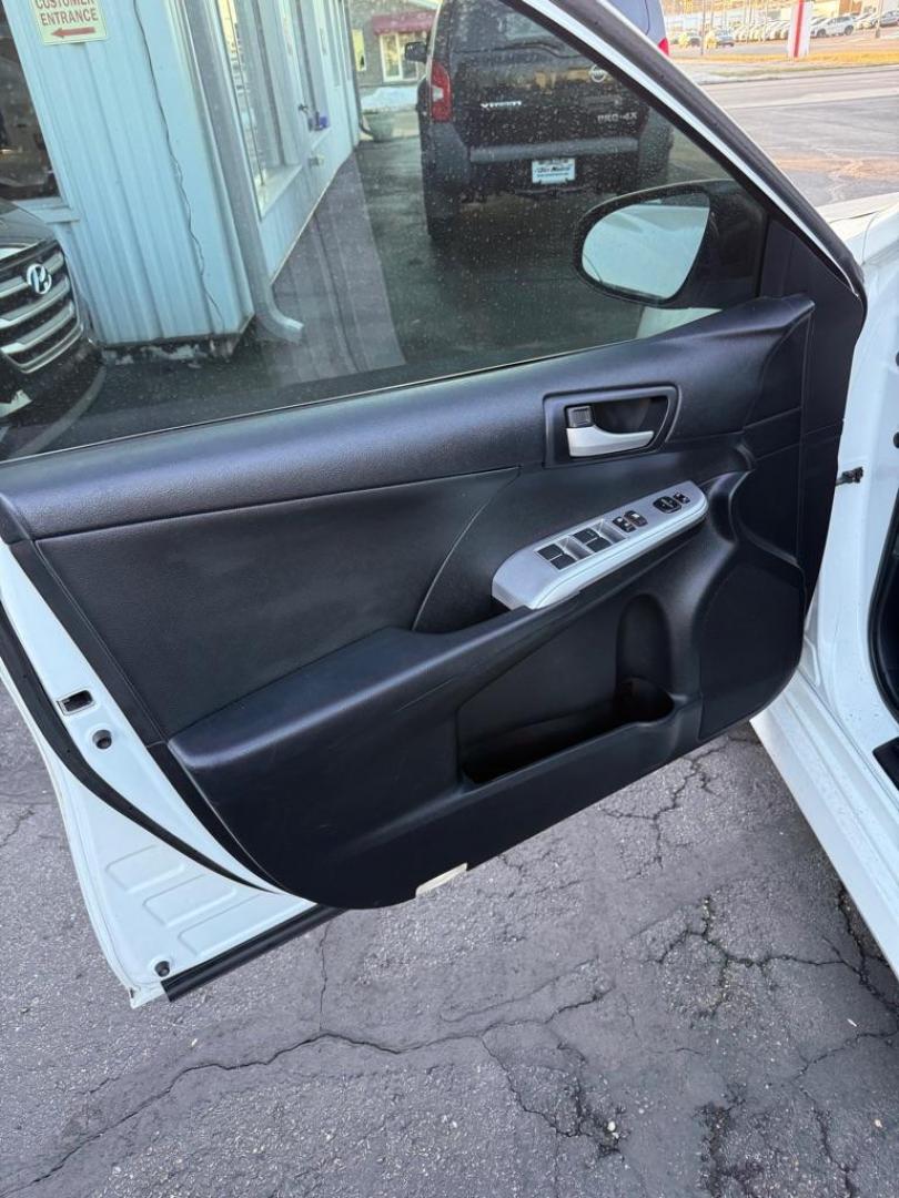 2014 WHITE TOYOTA CAMRY SE SPORT (4T1BF1FK5EU) with an 2.5L engine, Automatic transmission, located at 501 E. Columbia St., Springfield, OH, 45503, (800) 262-7122, 39.925262, -83.801796 - ***SE SPORT***New Front Brake Pads and Rotors***New Air Filter and Cabin Air Filter***Sunroof***Fresh Oil Change*** Jay North Auto has offered hand picked vehicles since 1965! Our customer's enjoy a NO pressure buying experience with a small town feel. We are a preferred dealer for many local - Photo#11